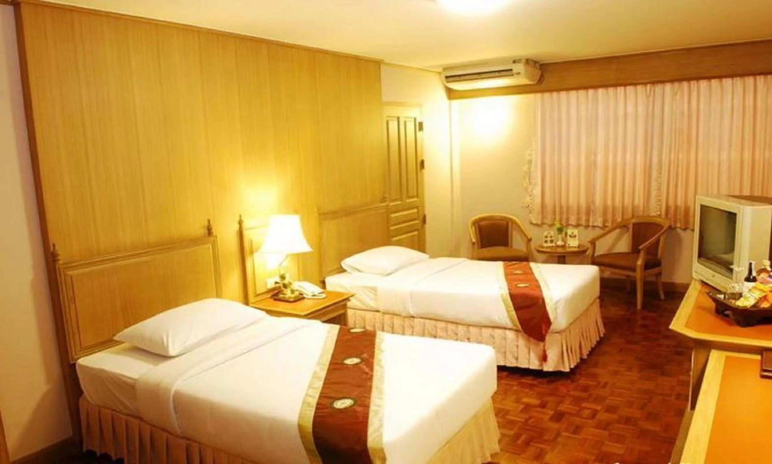 Bed in Silom Village Inn