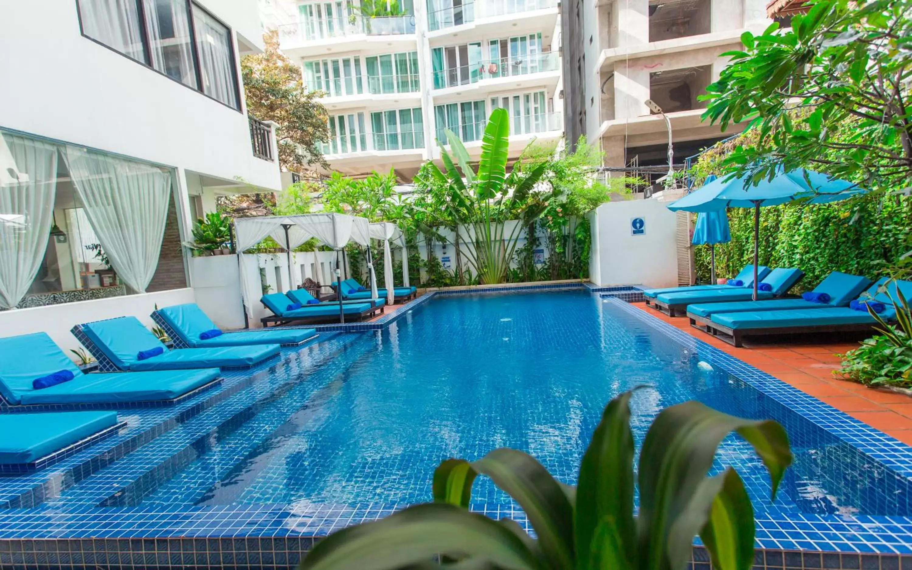 Property building, Swimming Pool in Home Chic Hotel