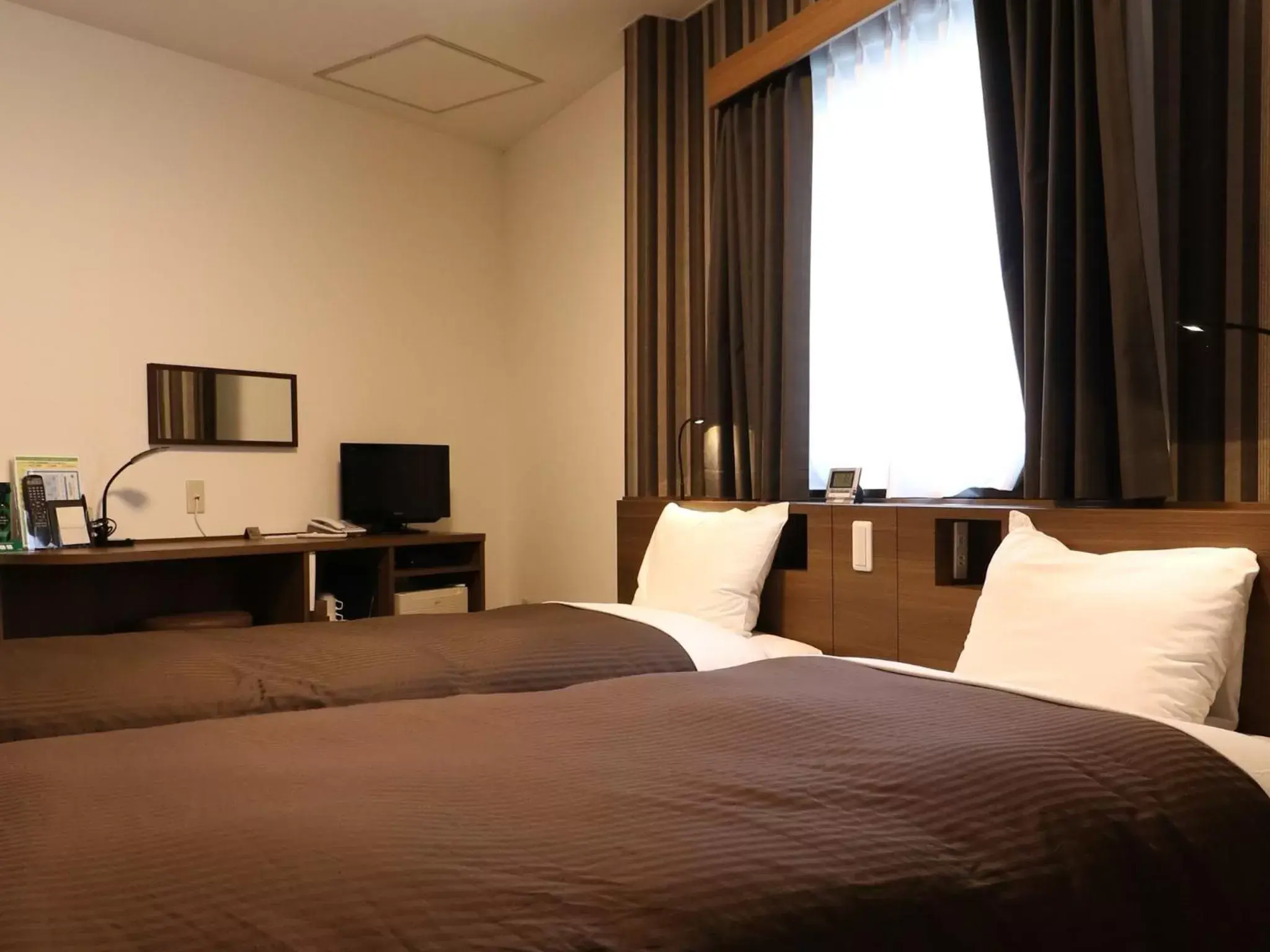 Photo of the whole room, Bed in Odawara Terminal Hotel