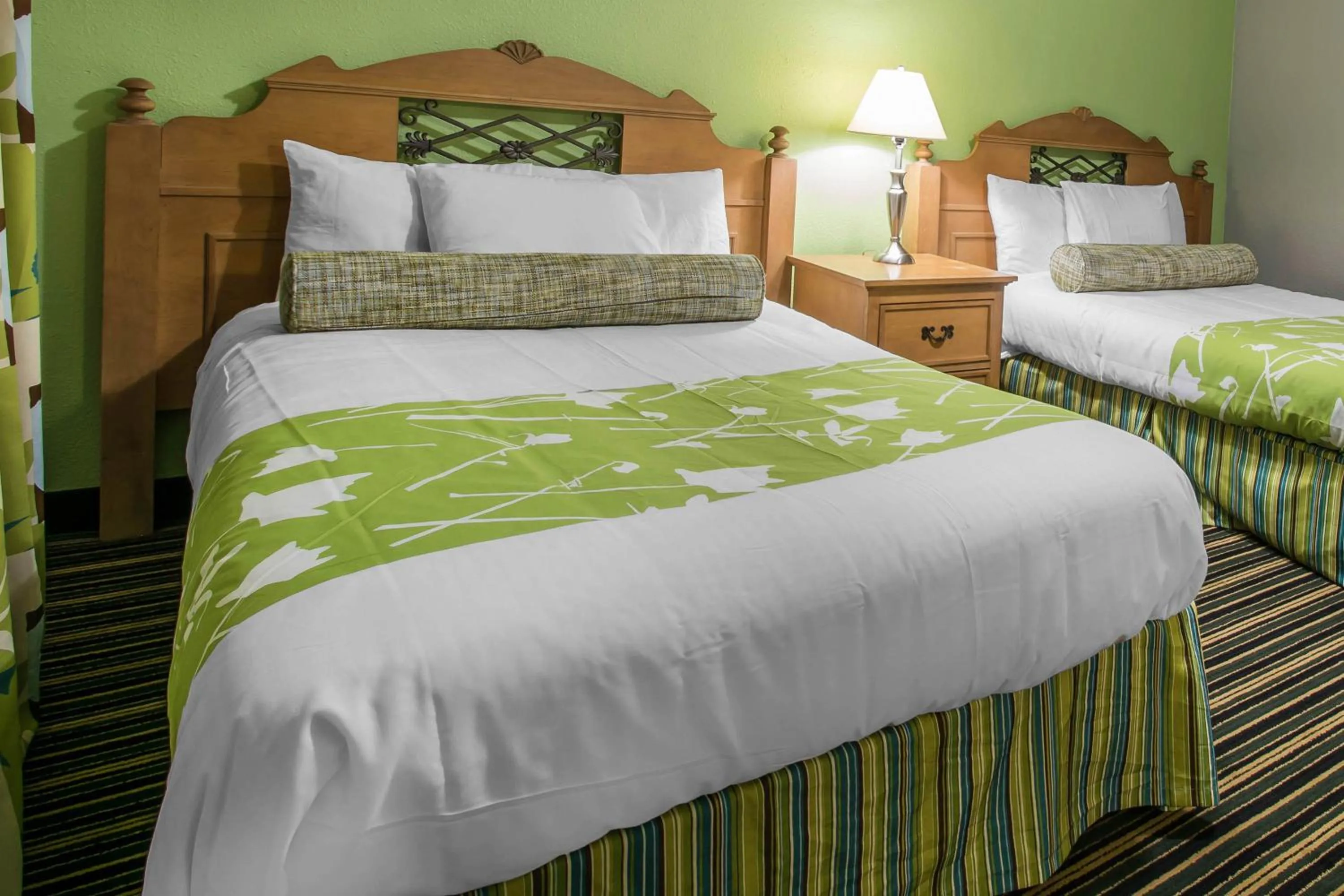 Bedroom, Bed in Rodeway Inn & Suites Winter Haven Chain of Lakes