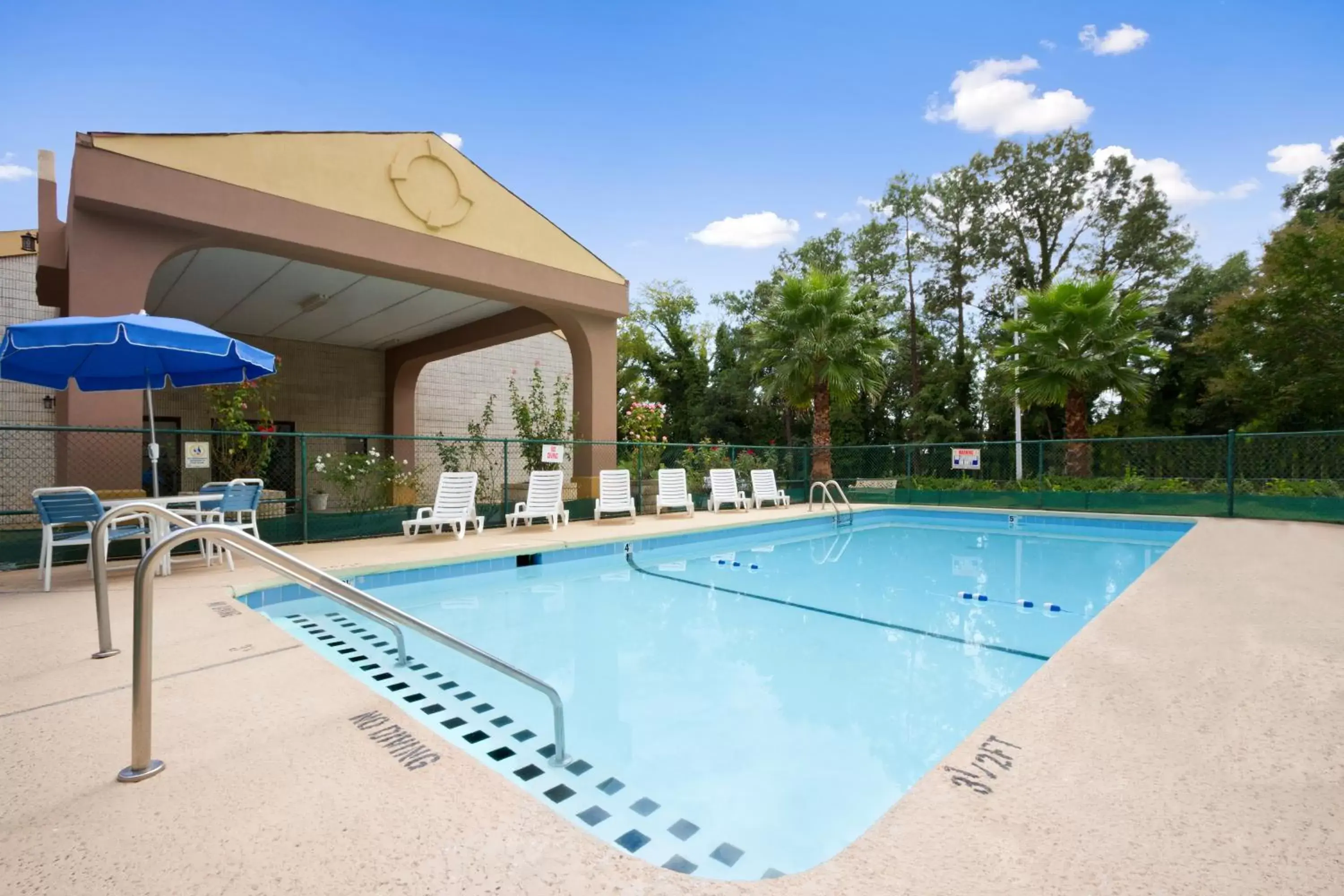 Swimming Pool in Days Inn by Wyndham Raleigh Midtown