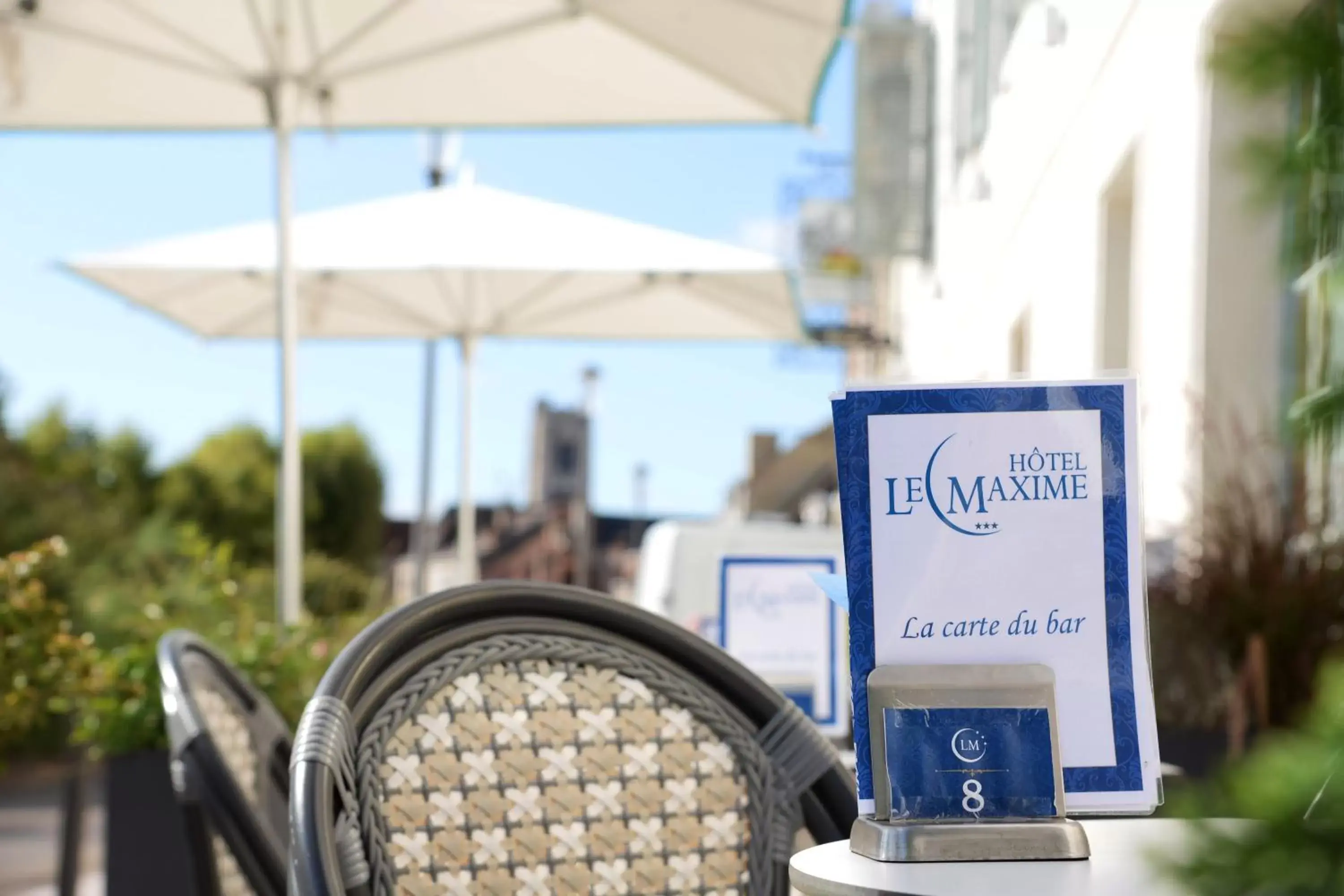 Lounge or bar in Hôtel Le Maxime - Best Western Signature Collection