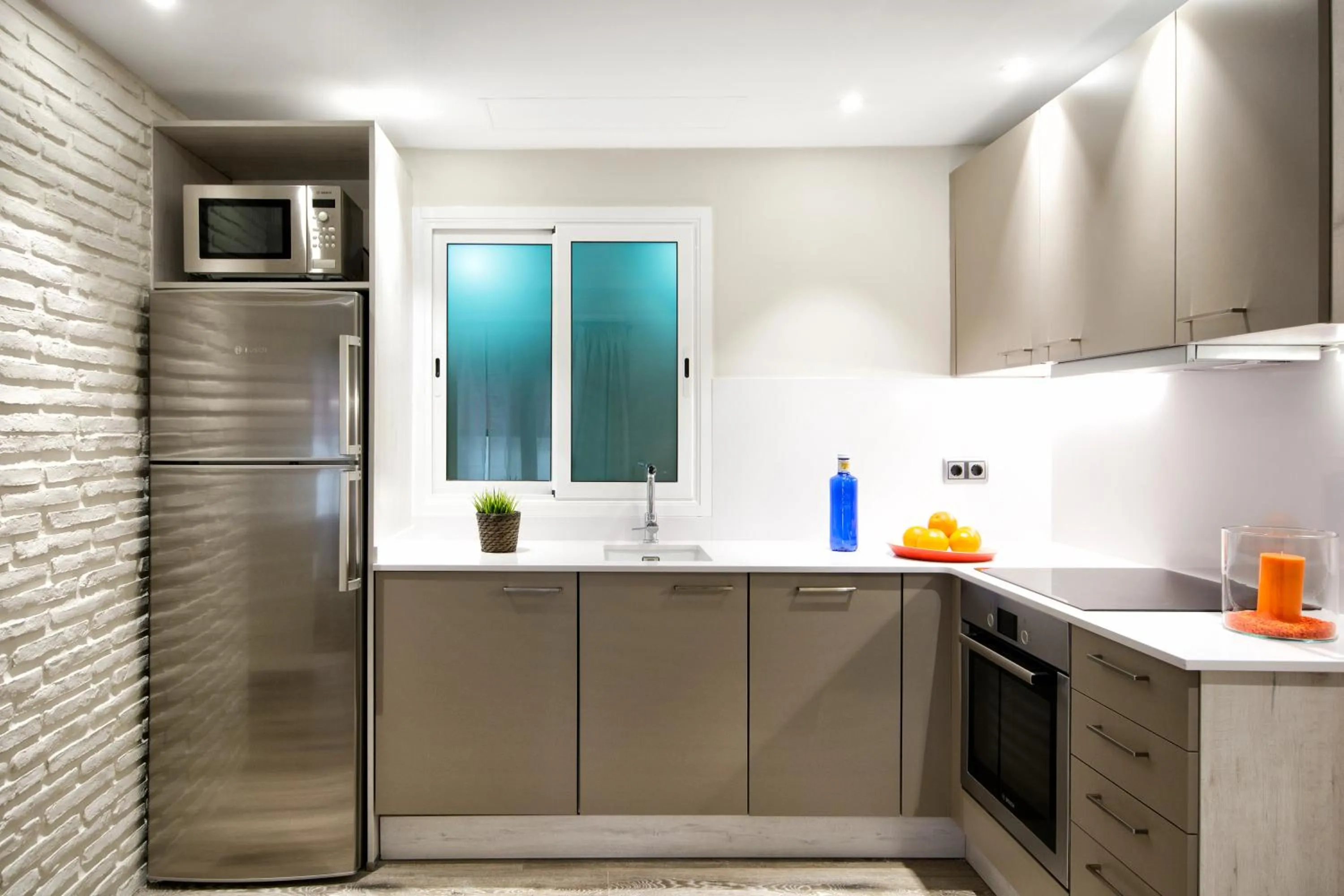 Kitchen or kitchenette in Eixample Building Apartments by Mercedes Heritage