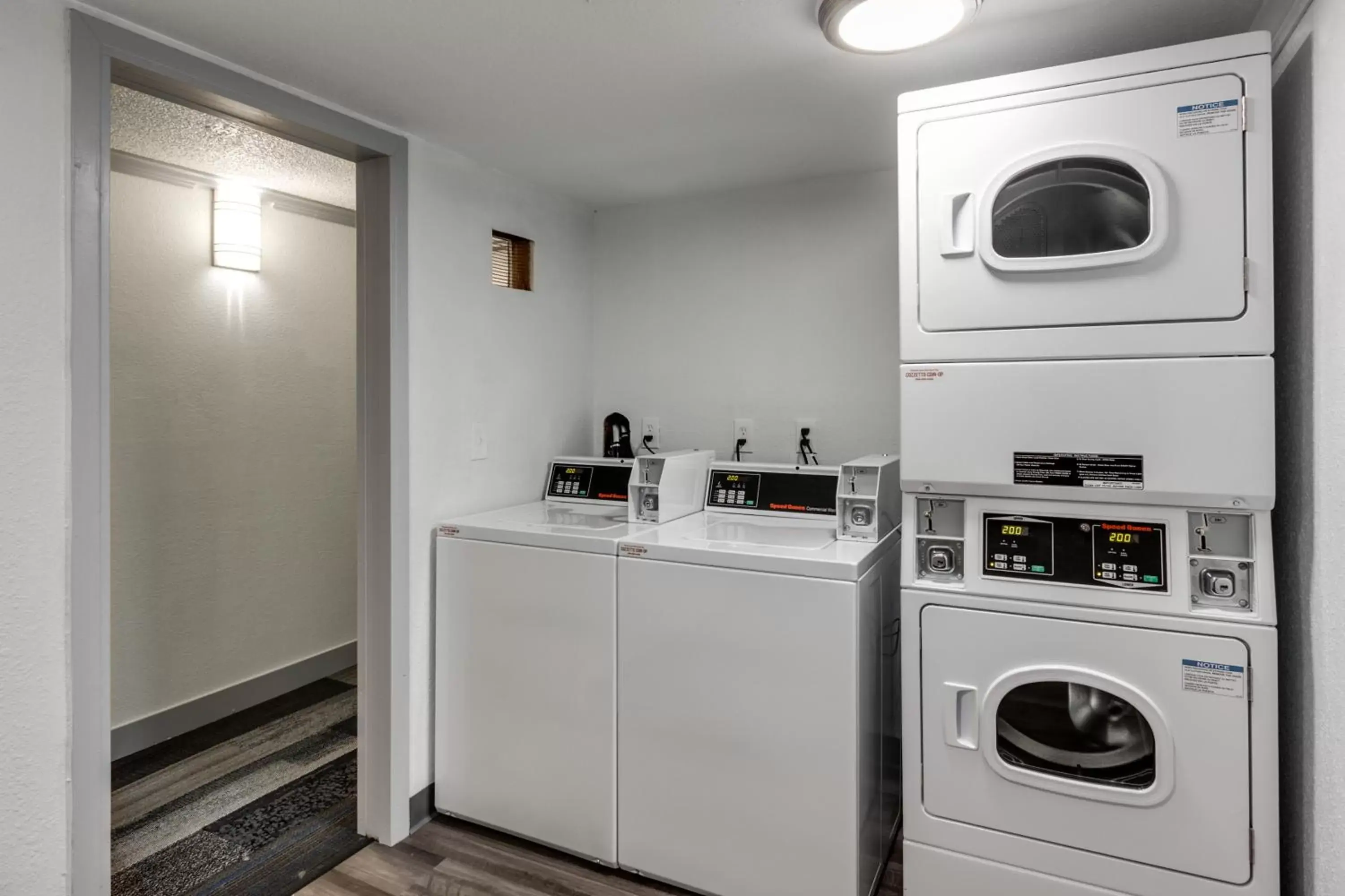 laundry, Kitchen/Kitchenette in Days Inn & Suites by Wyndham Spokane