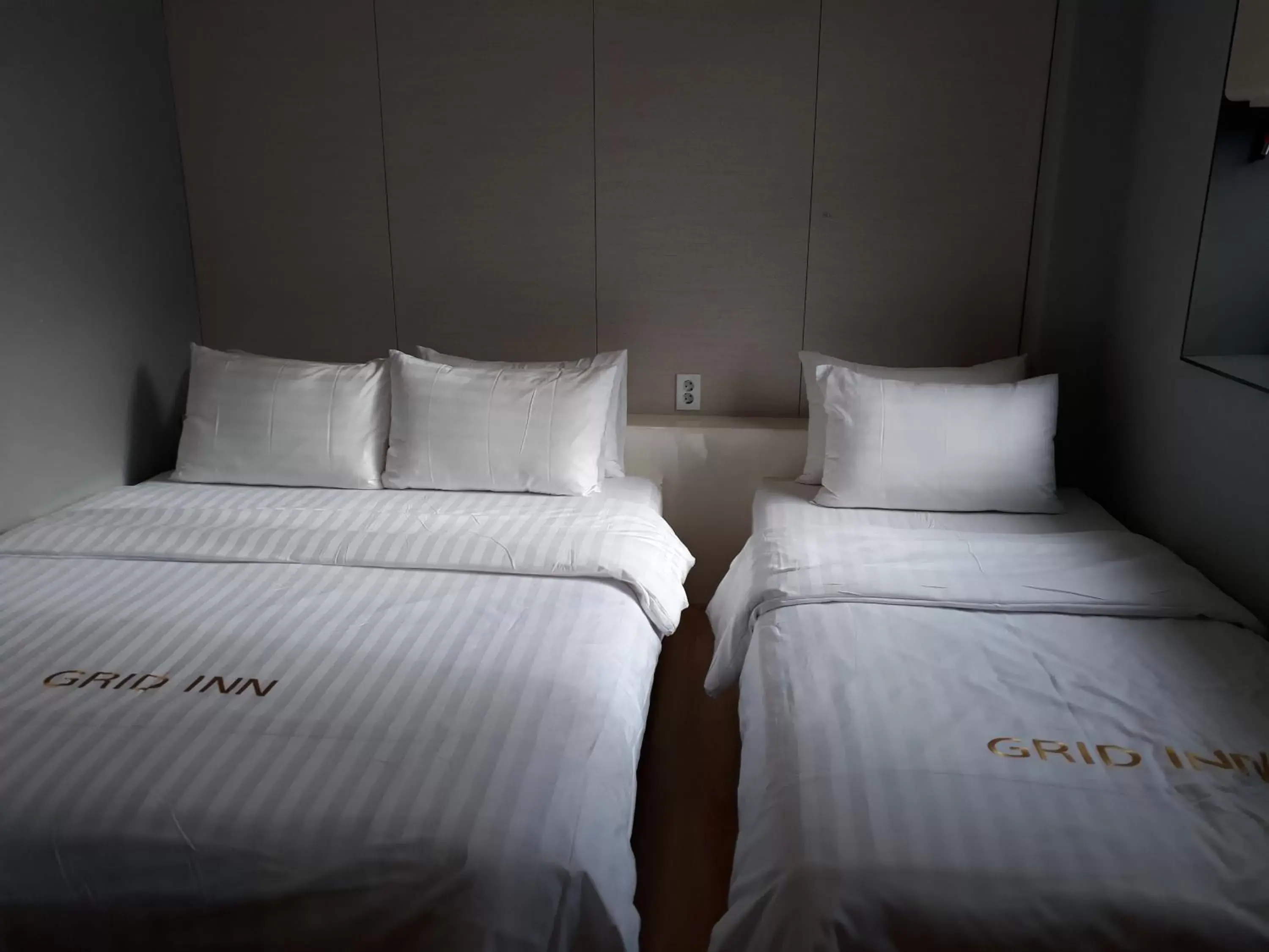 Bedroom, Bed in Grid Inn Hotel