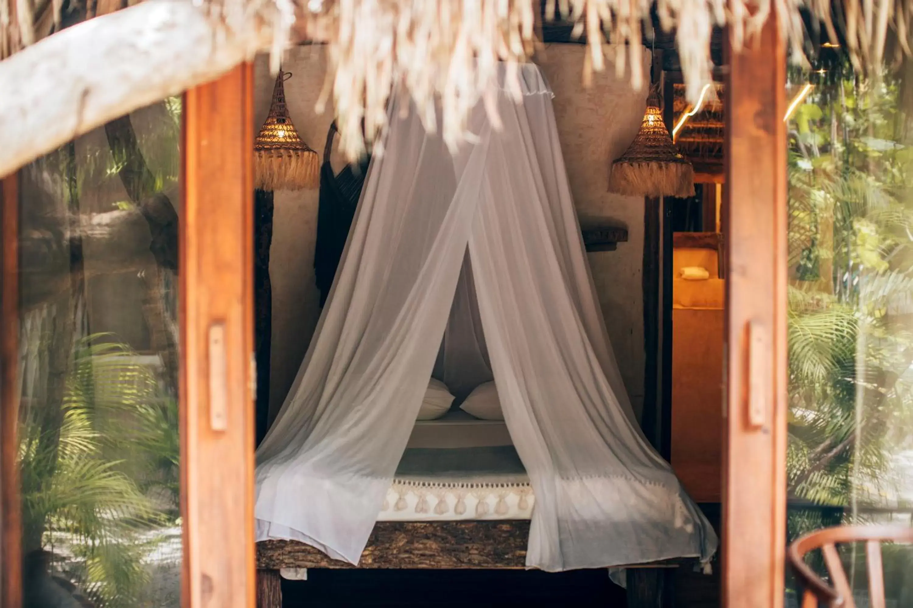 Bed in Ikal Tulum Hotel