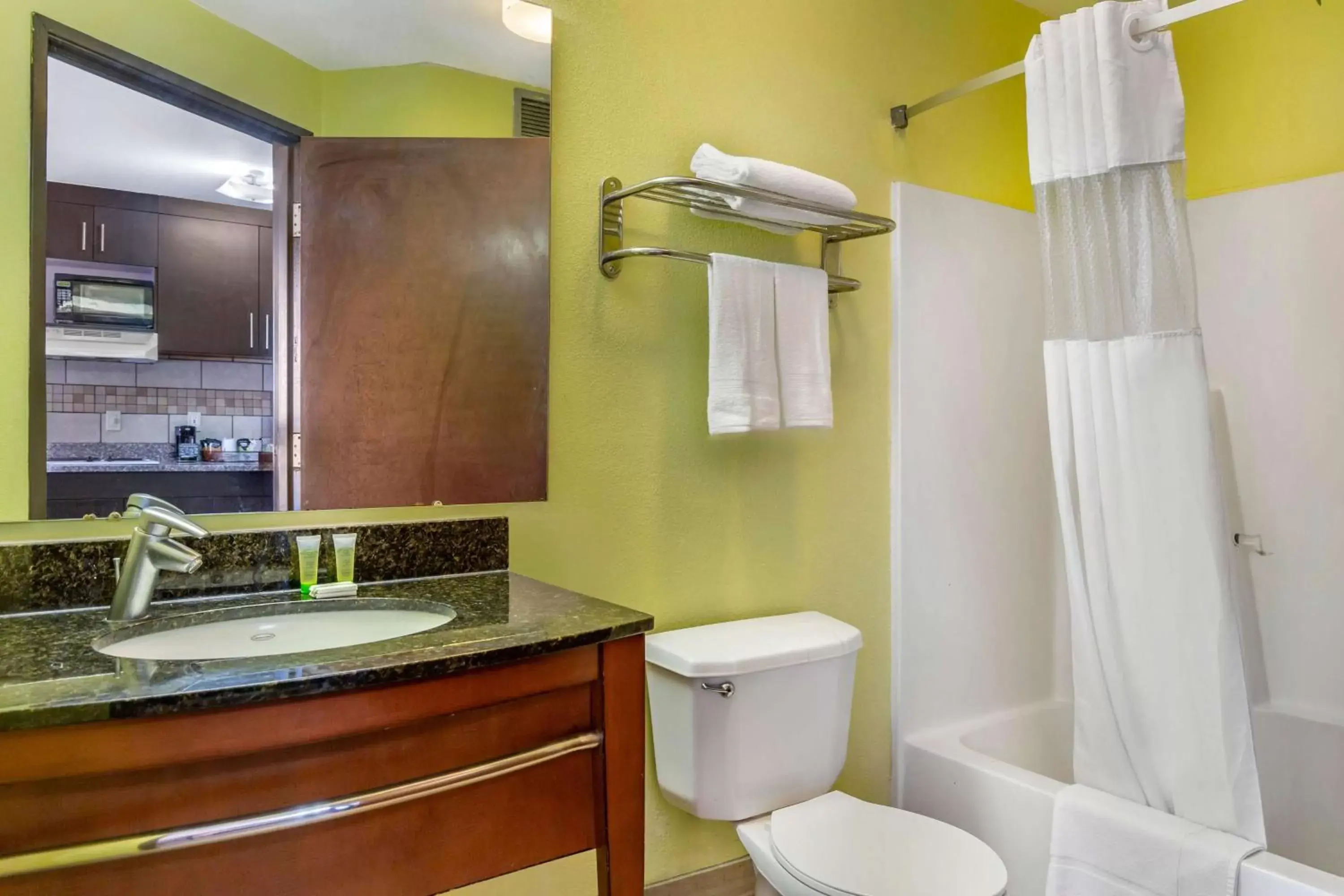 TV and multimedia, Bathroom in Days Inn & Suites by Wyndham Rocky Mount Golden East