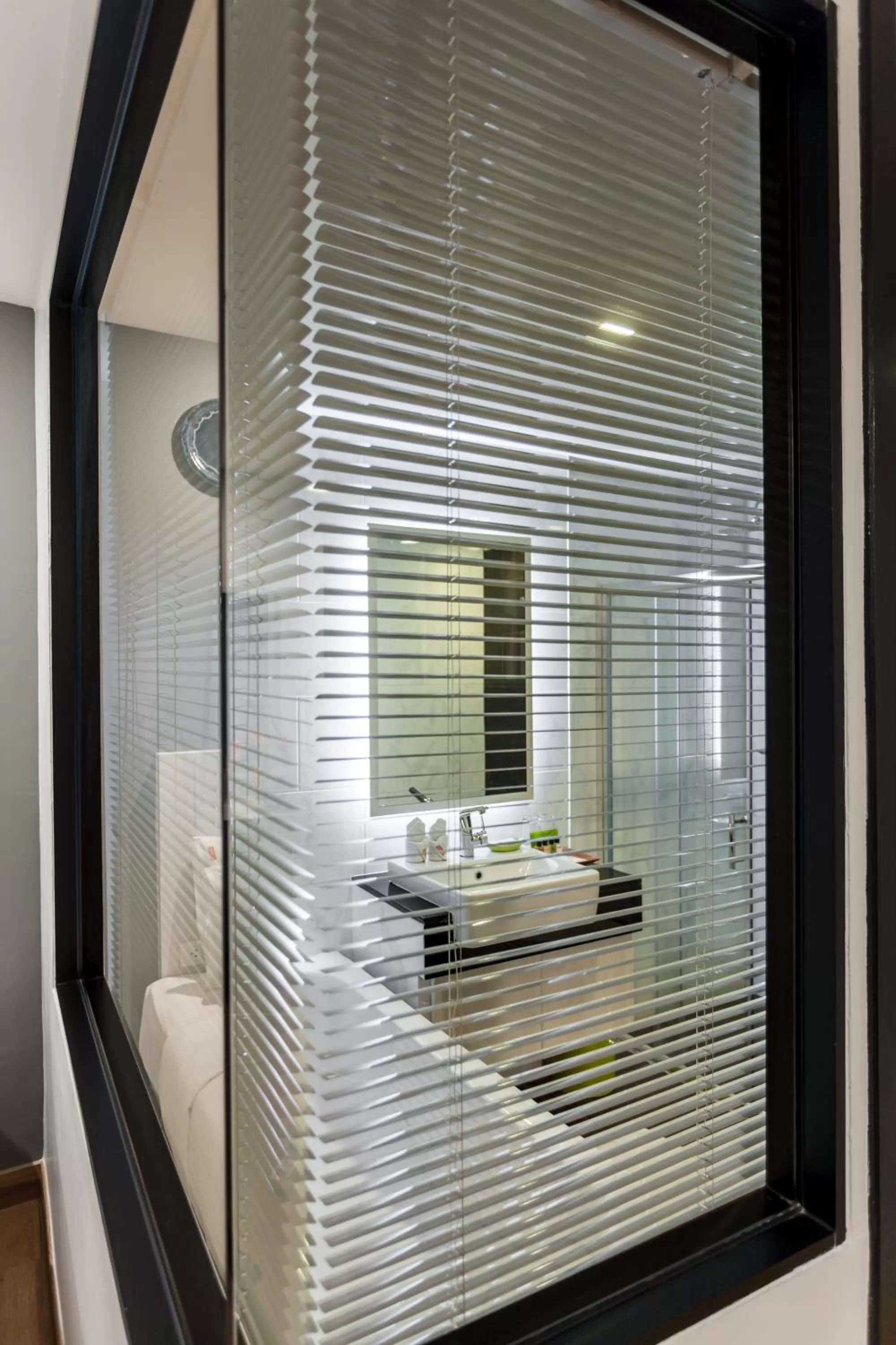 Bathroom in Cmor by Recall Hotels SHA Extra Plus