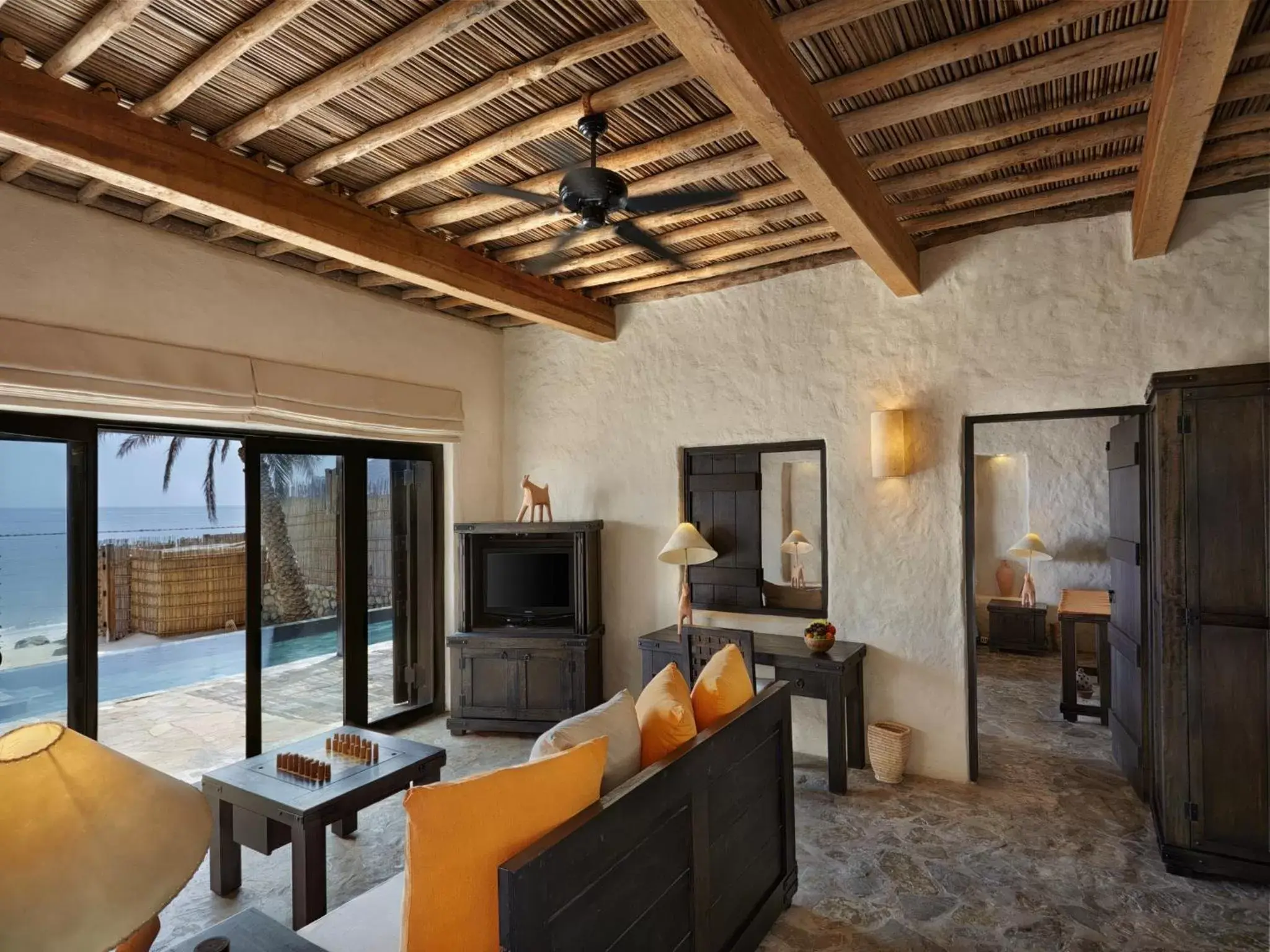 Living room, TV/Entertainment Center in Six Senses Zighy Bay