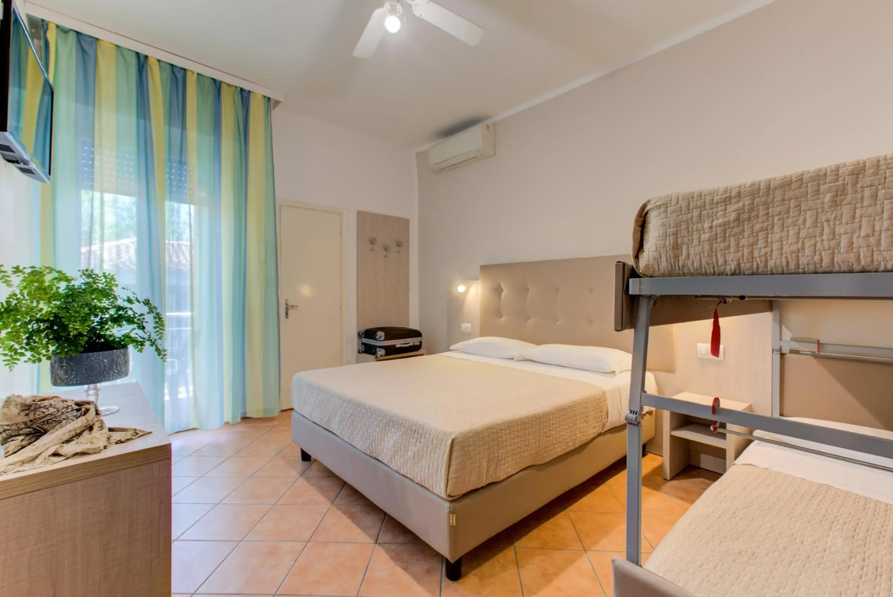 Quadruple Room with Balcony in Hotel Cimarosa