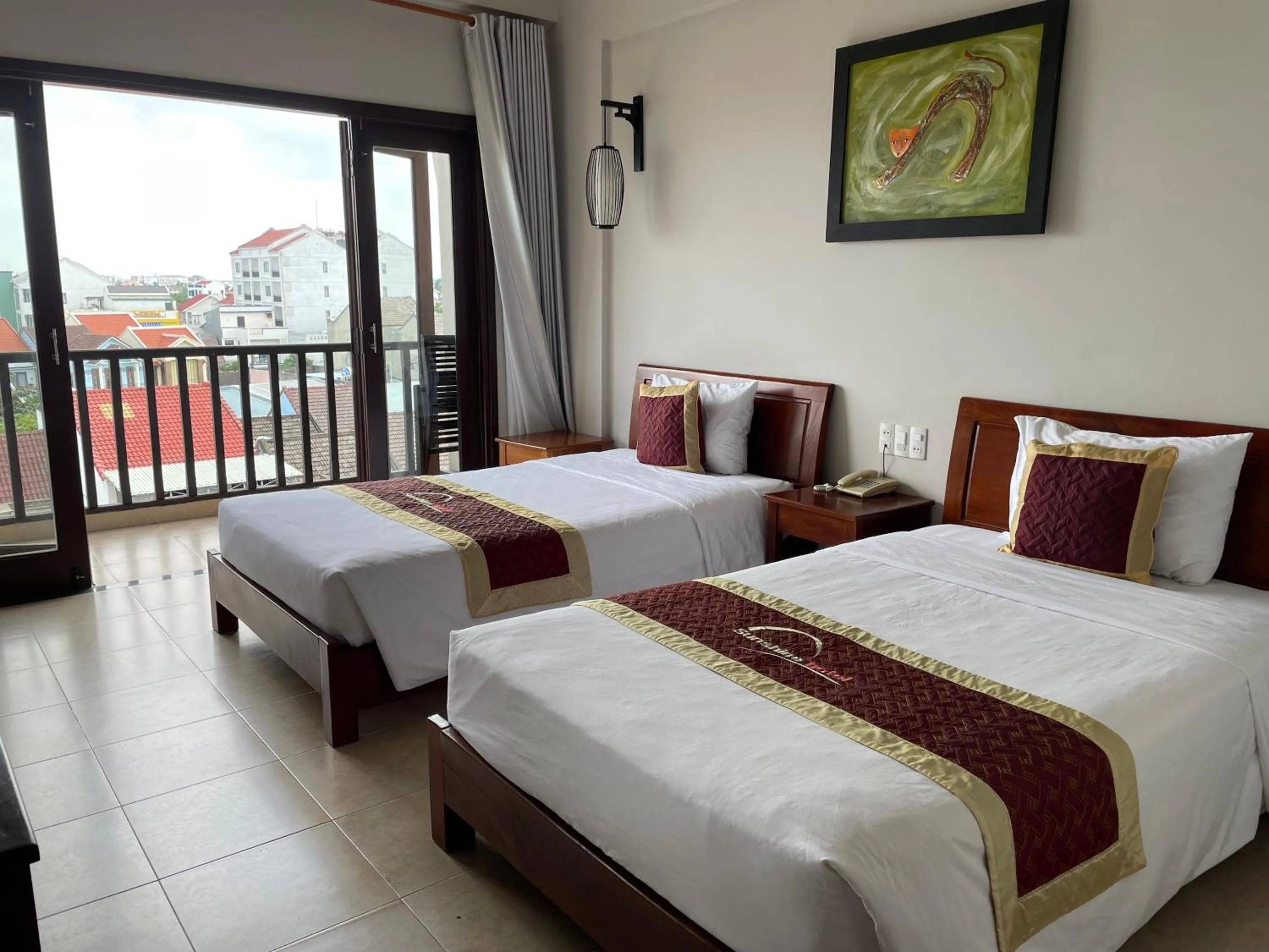 Bed in Sunshine Hoian Hotel