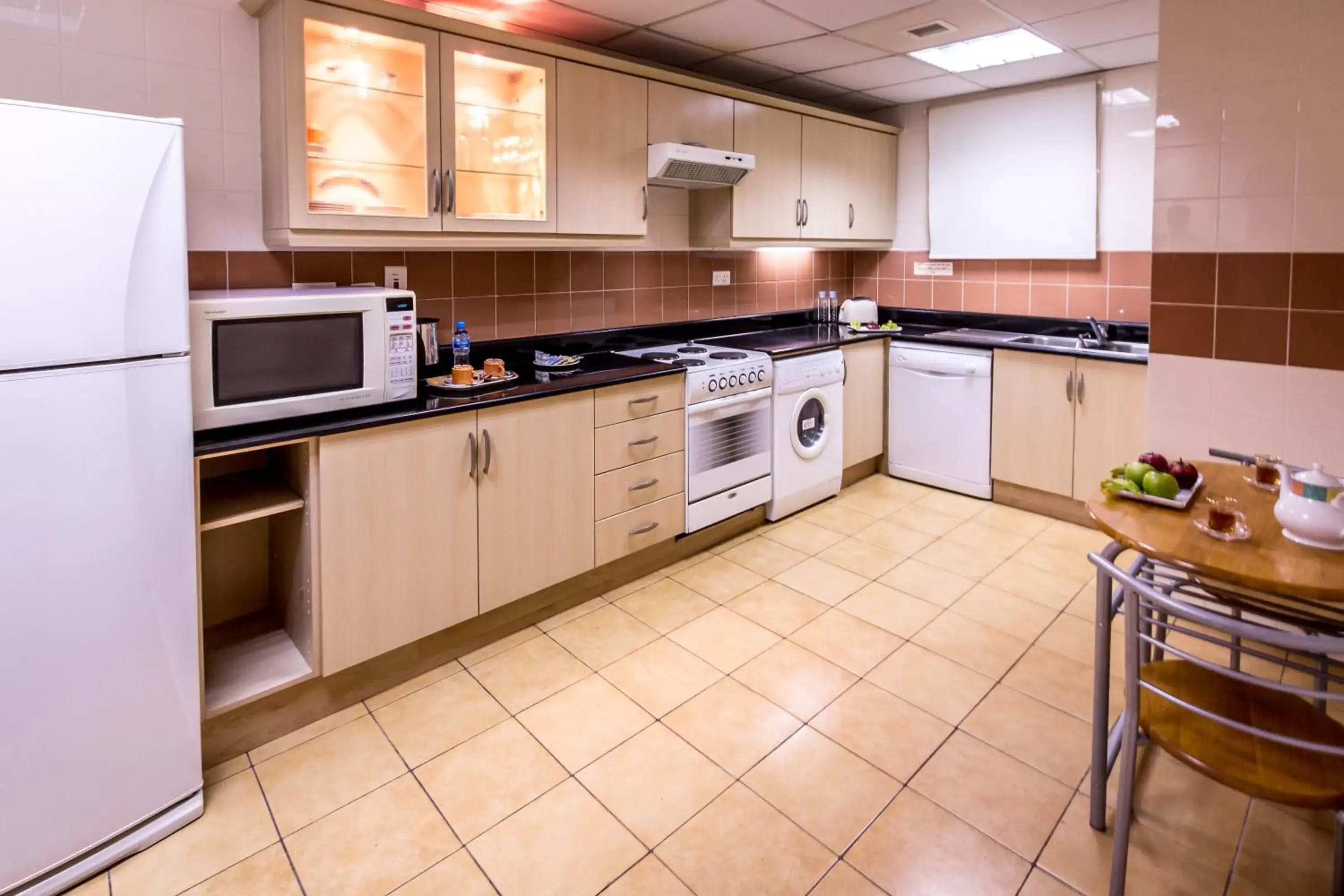 Kitchen or kitchenette, Kitchen/Kitchenette in Elite Seef Residence And Hotel