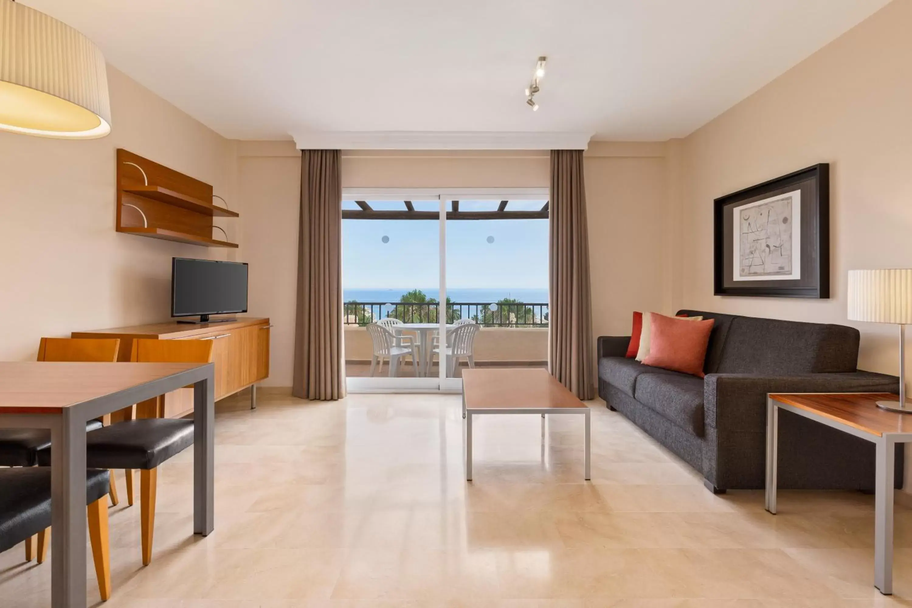Living room in Ramada Hotel & Suites by Wyndham Costa del Sol