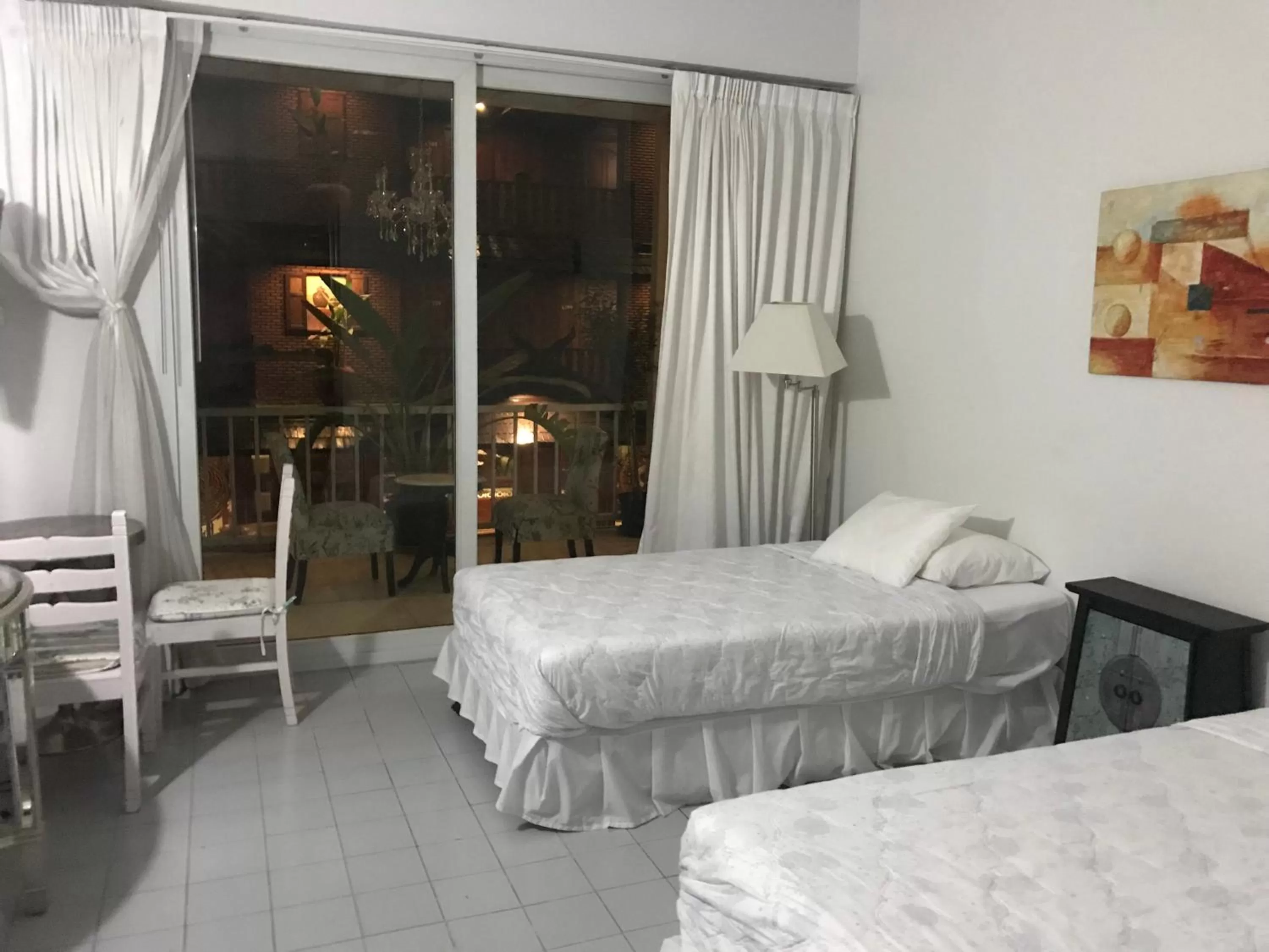 Bed in Oriental Smile Hotel