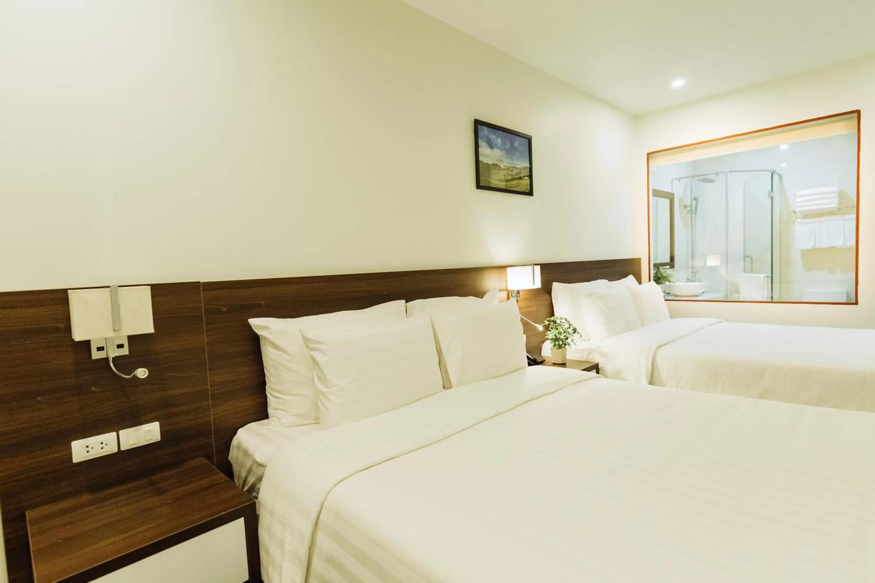Bed in Paragon Noi bai Hotel & Pool