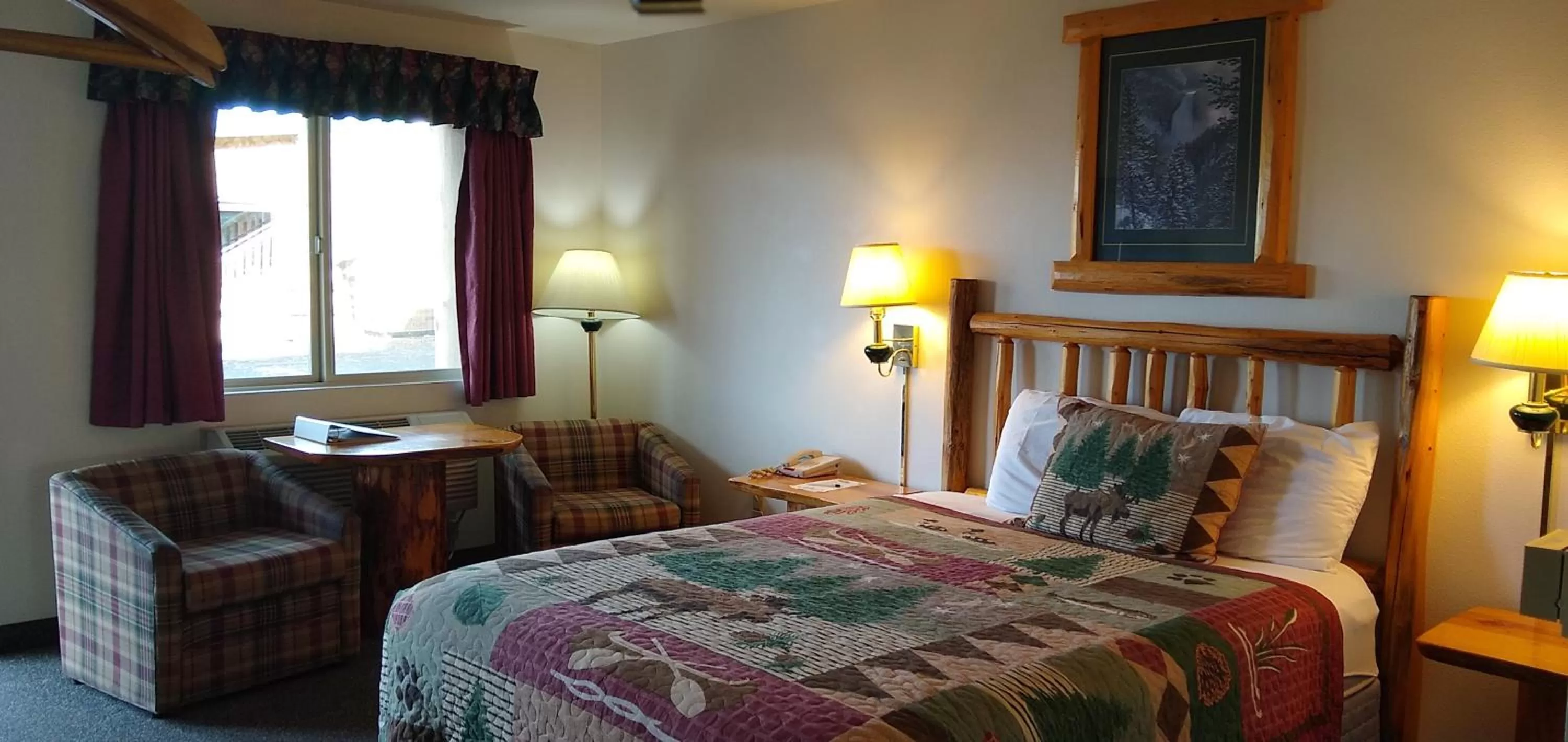 Bed in Ponderosa Motel