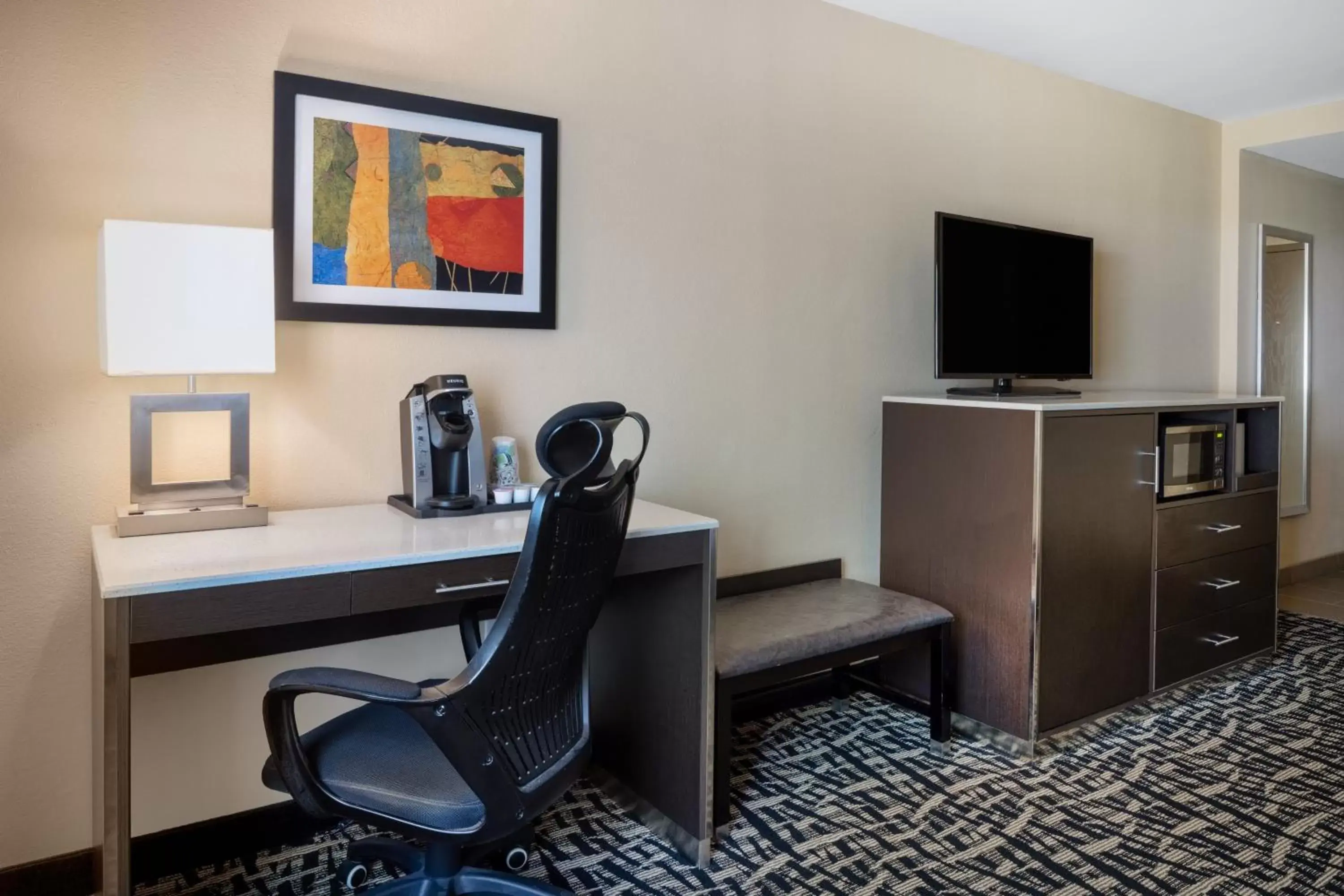 Photo of the whole room, TV/Entertainment Center in Holiday Inn Poughkeepsie, an IHG Hotel