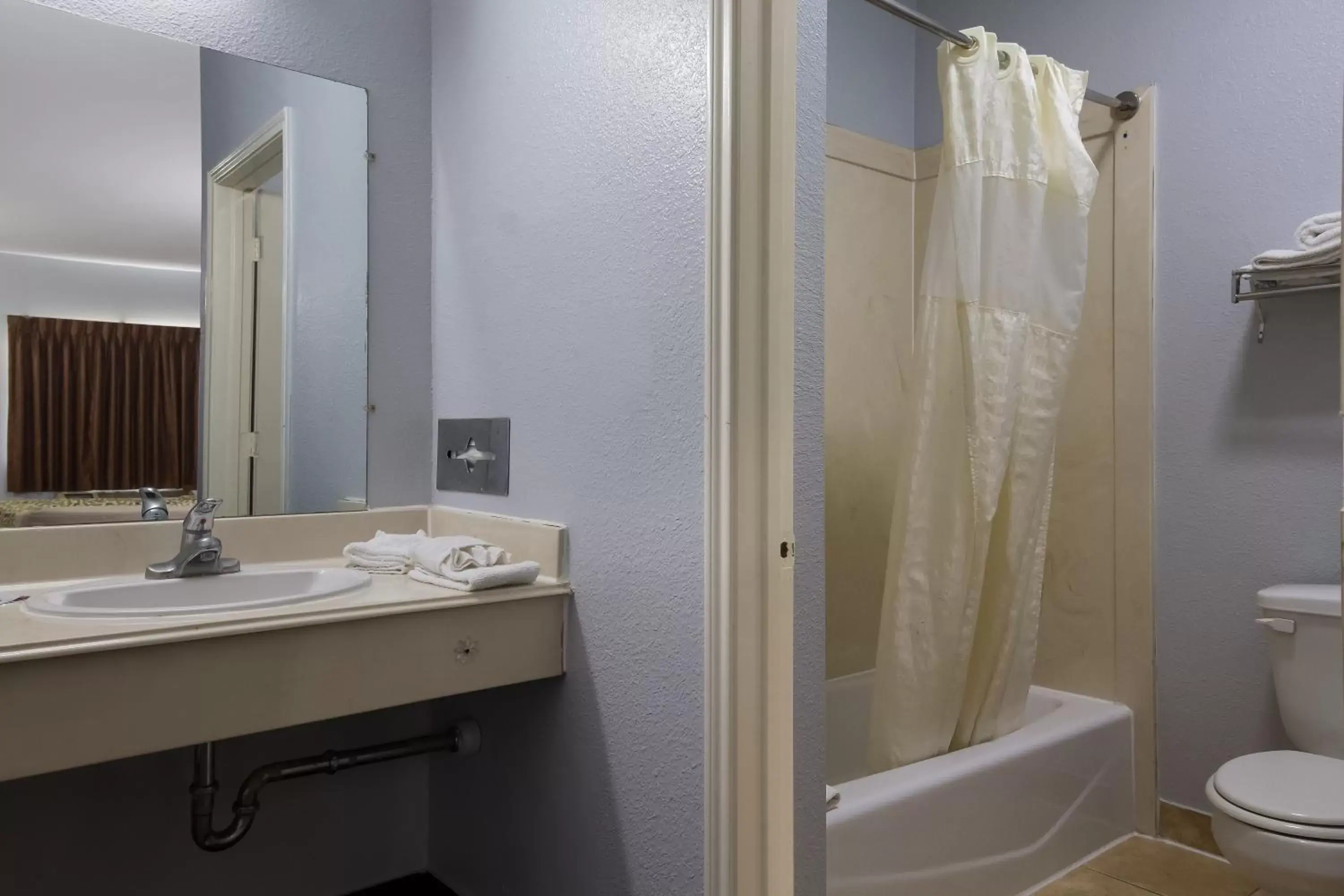 Bathroom in Scottish Inn & Suites