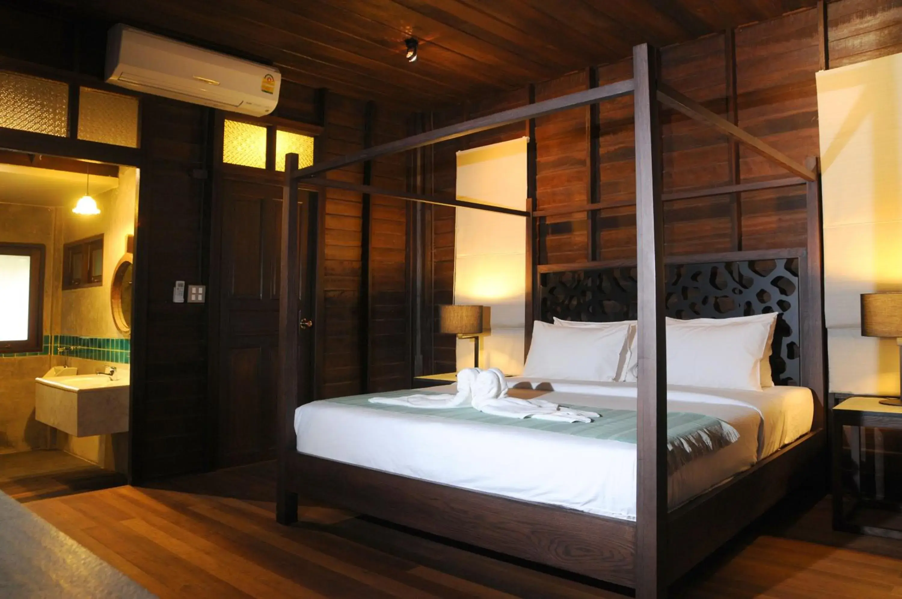 Bed in Baansuanramita Resort