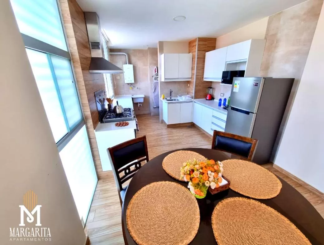 Kitchen or kitchenette in Margarita Apartamentos