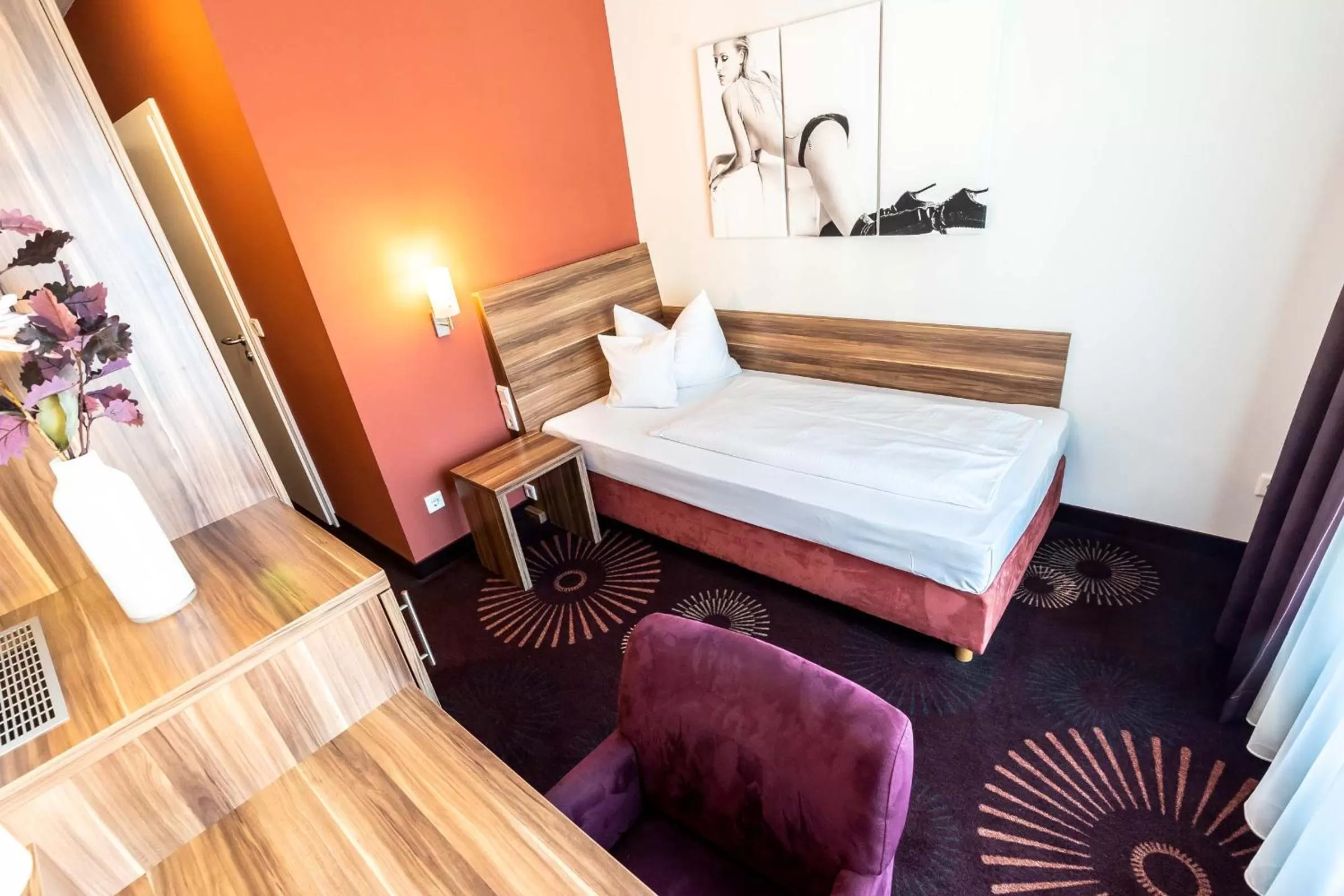 Bed in Altstadthotel Guesthouse Die Galerie