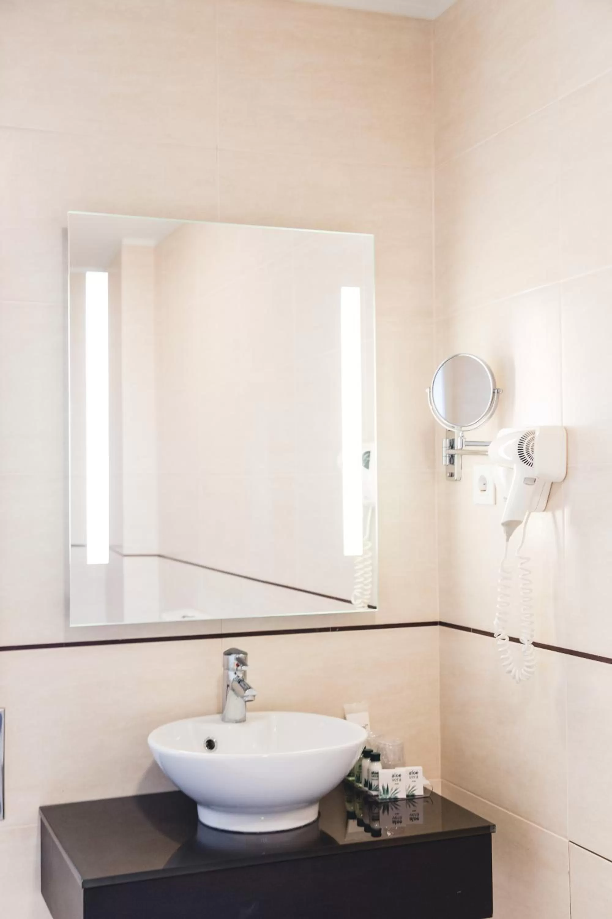 Bathroom in Hotel Aveiro Center by Alboi Group