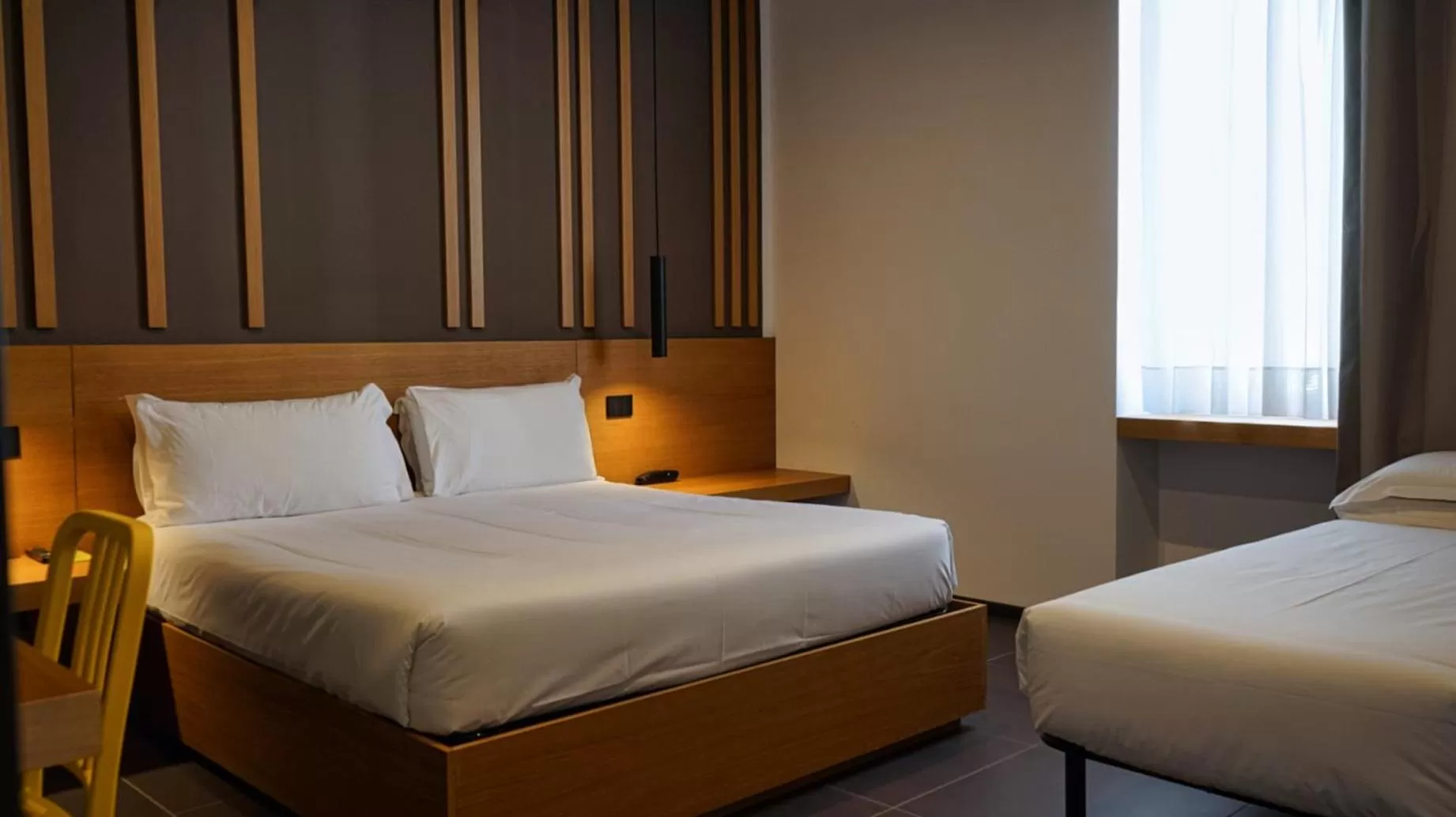 Bed in Central Lodge Hotel