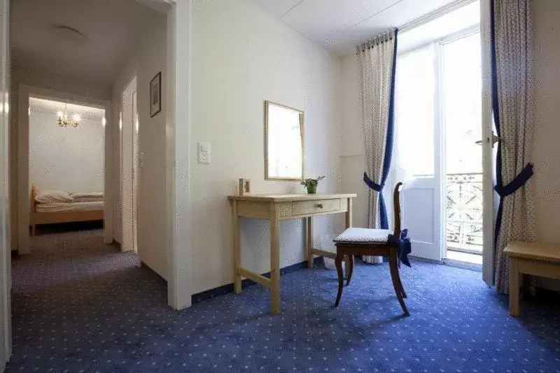 Quadruple Room in Hôtel du Cerf
