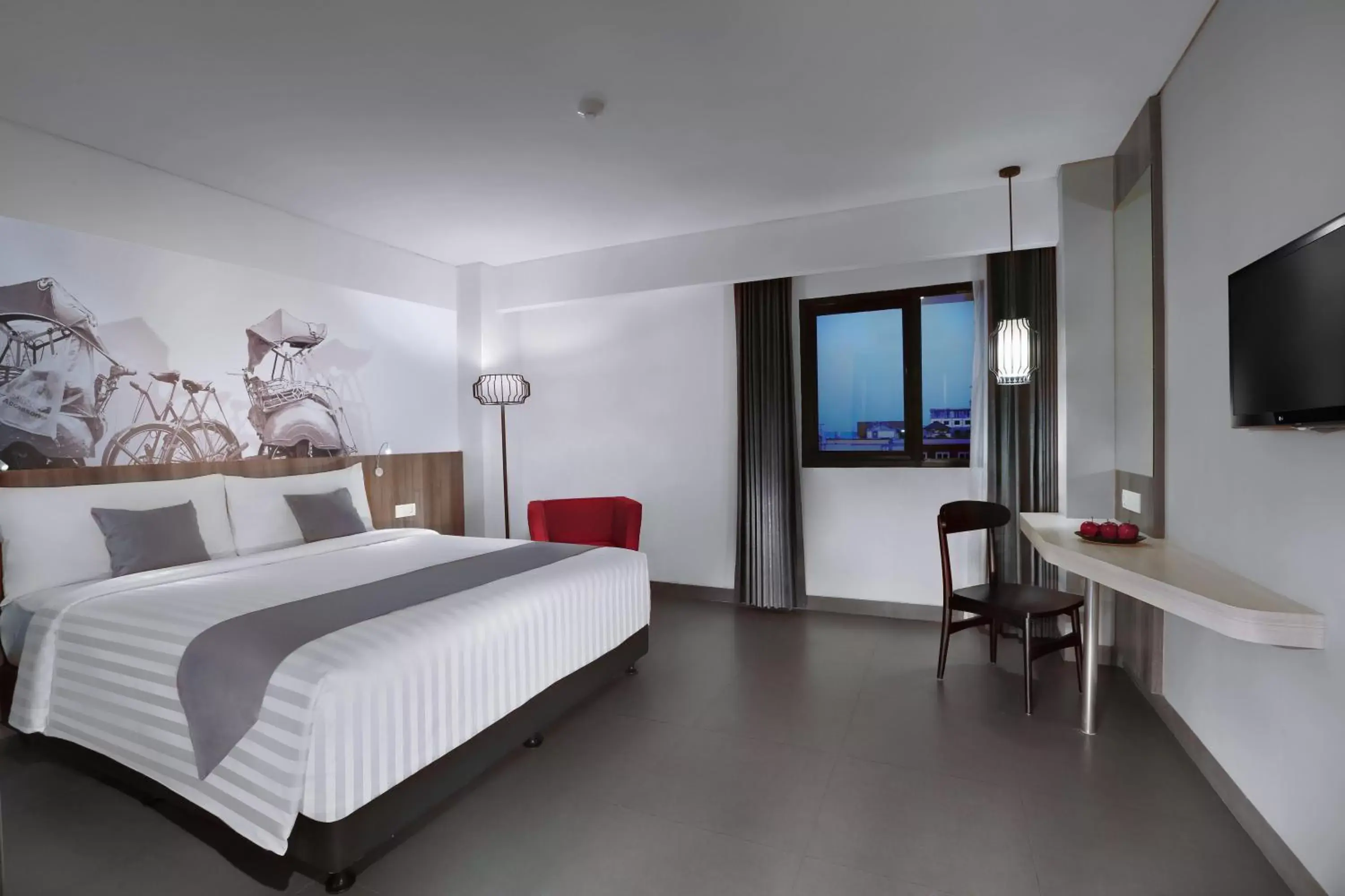 Bedroom in Hotel Neo Malioboro by ASTON