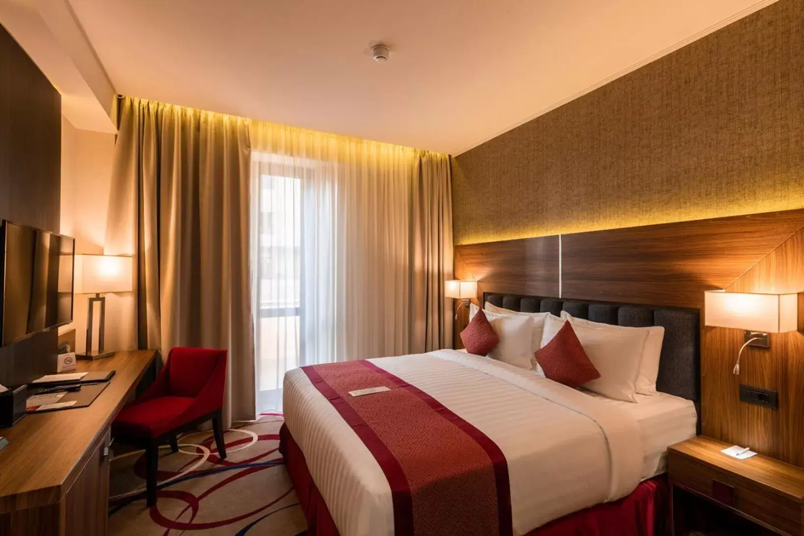 Bed in Ramada Hotel & Suites by Wyndham Yerevan