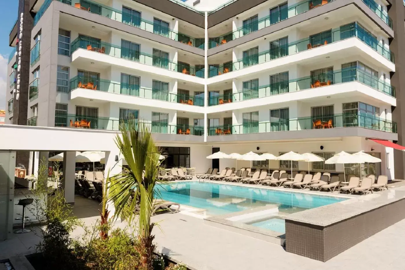 Property building, Swimming Pool in Green Garden Suites Hotel