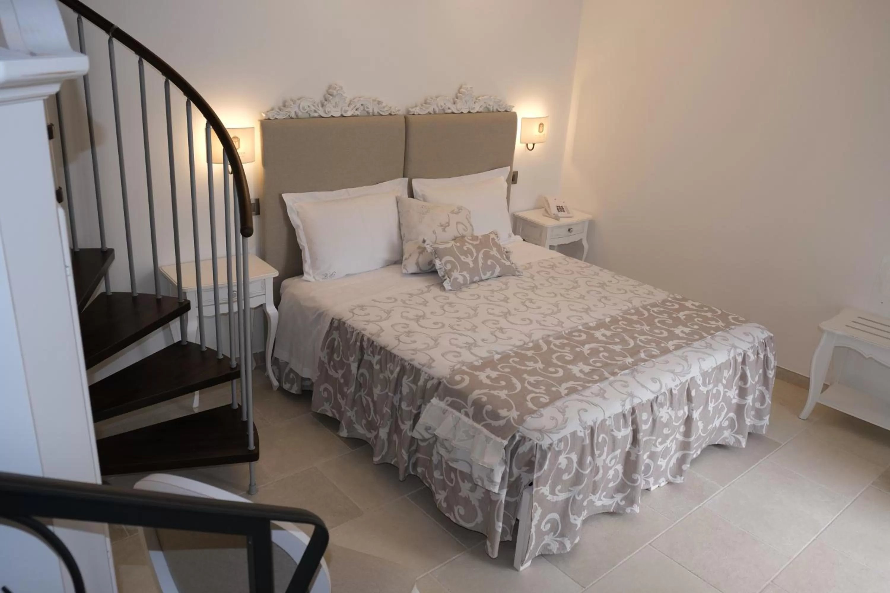 Bed in PLAZACARRISI HOTEL & SPA