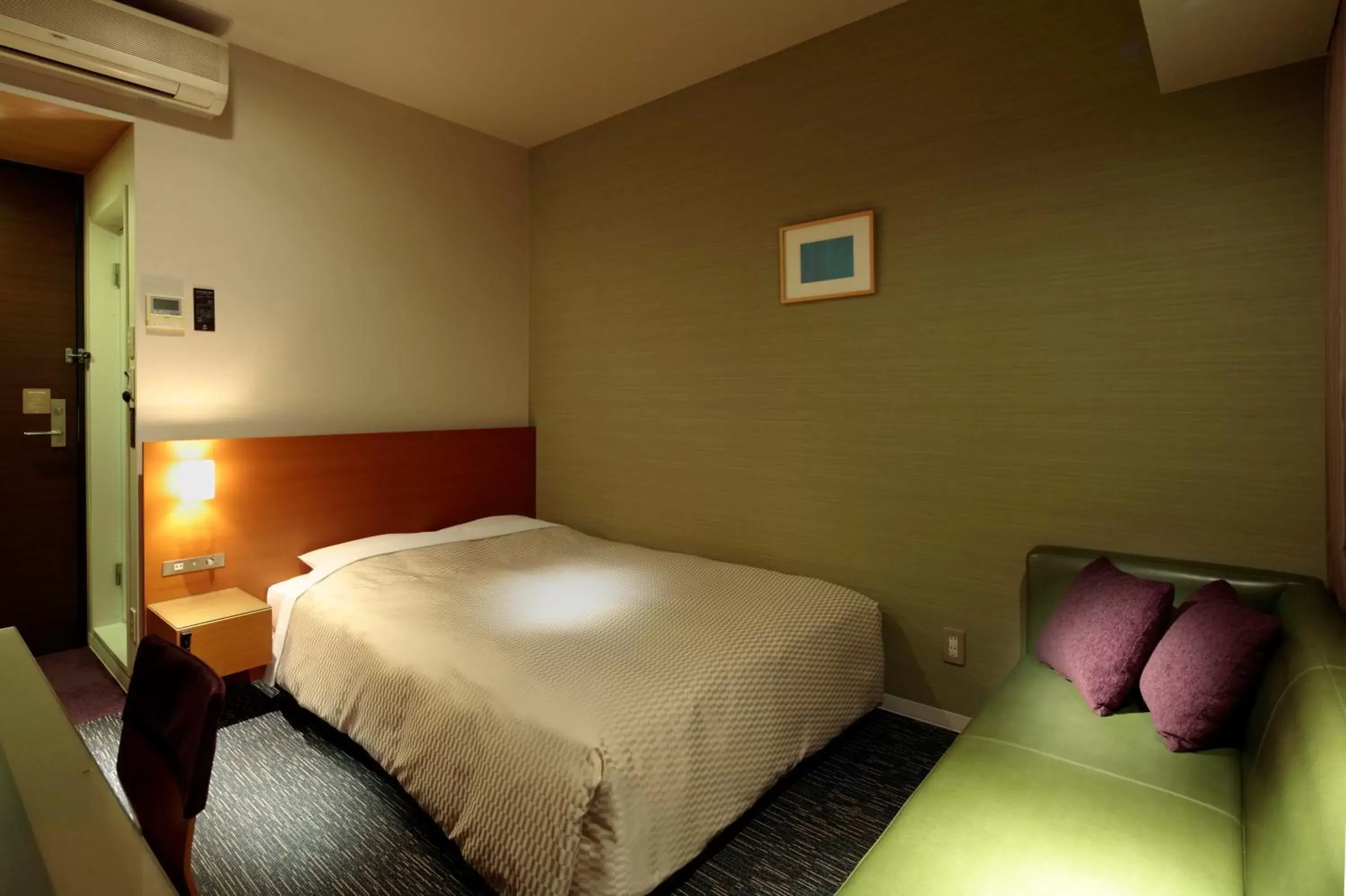 Bed in Candeo Hotels Fukuyama Bed in Candeo Hotels Fukuyama