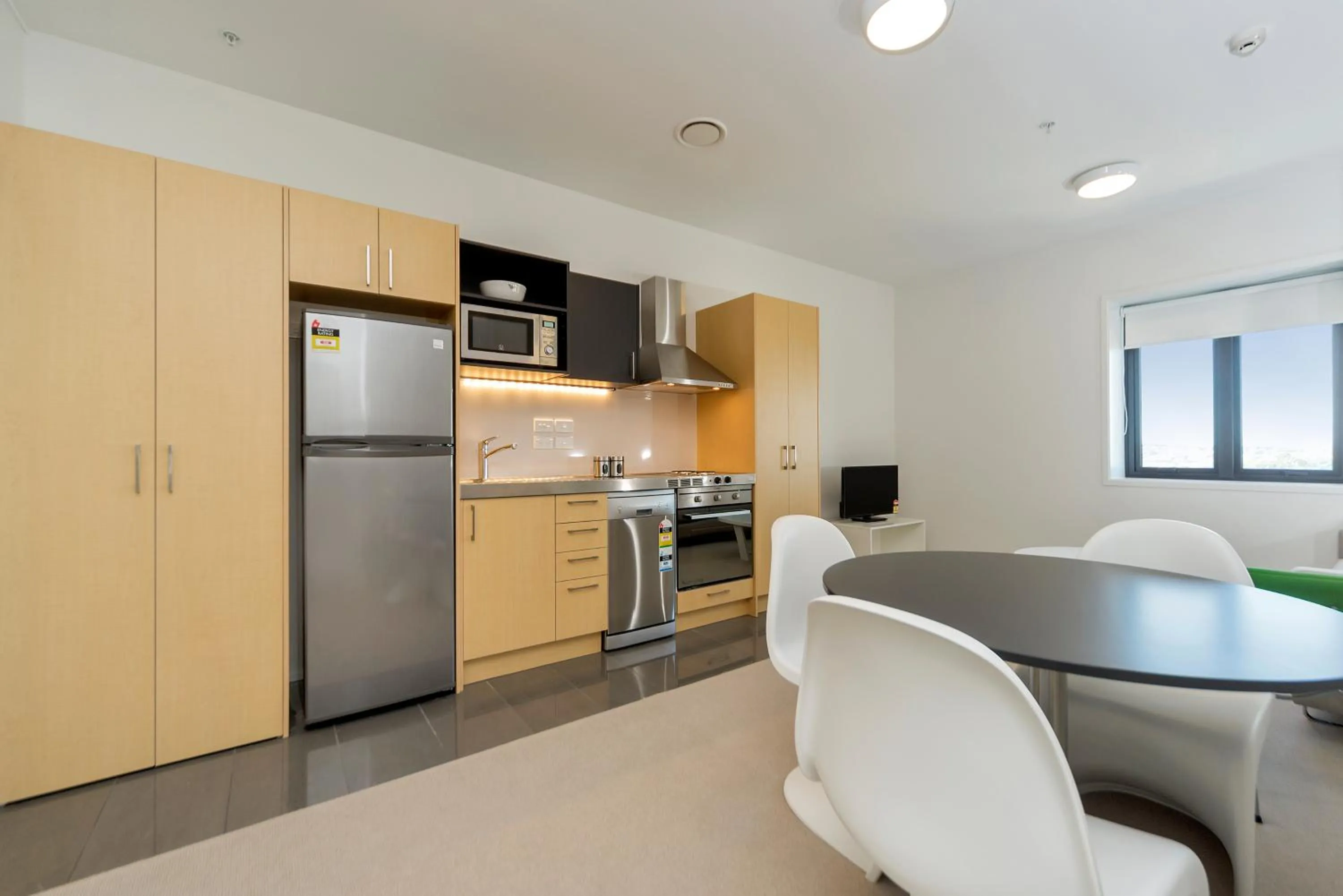Kitchen or kitchenette in MCentral Apartments Manukau