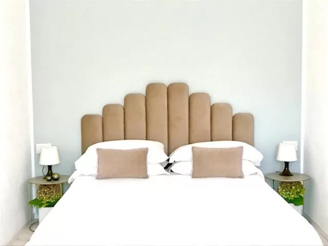 Bed in S'O Suites Tropea