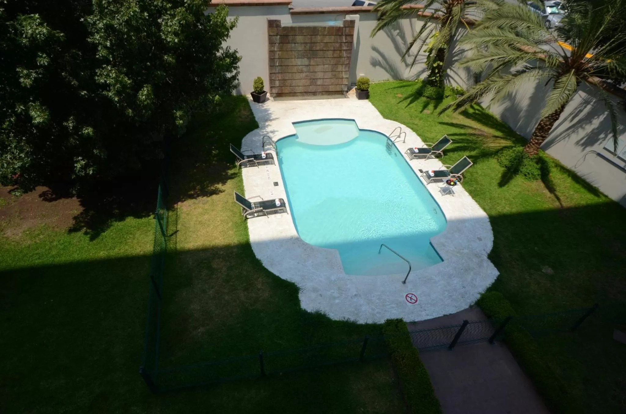 Swimming pool in Holiday Inn Monterrey Valle by IHG