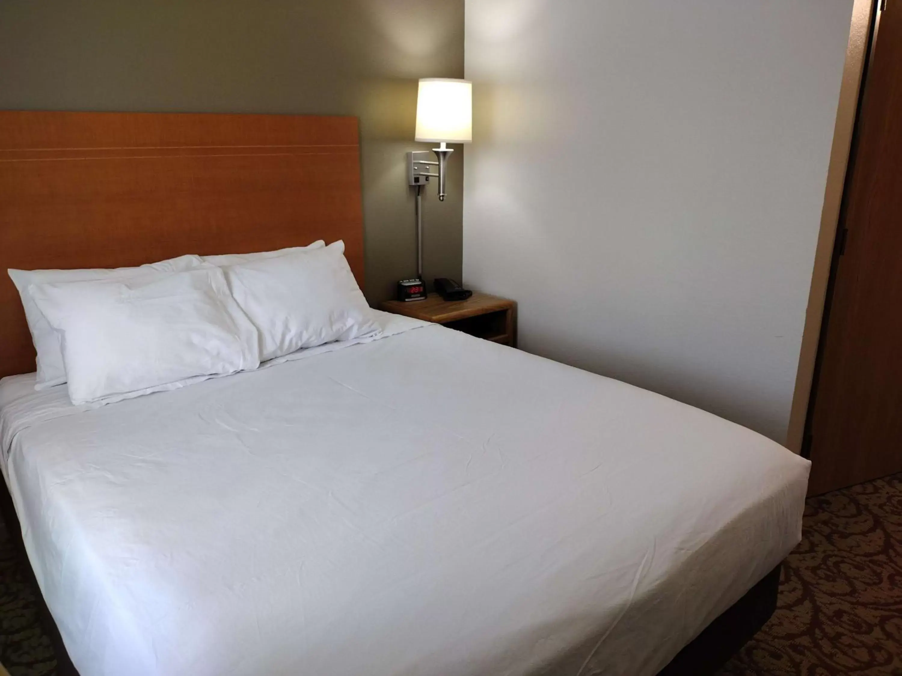 Bed in SureStay Hotel by Best Western Spicer