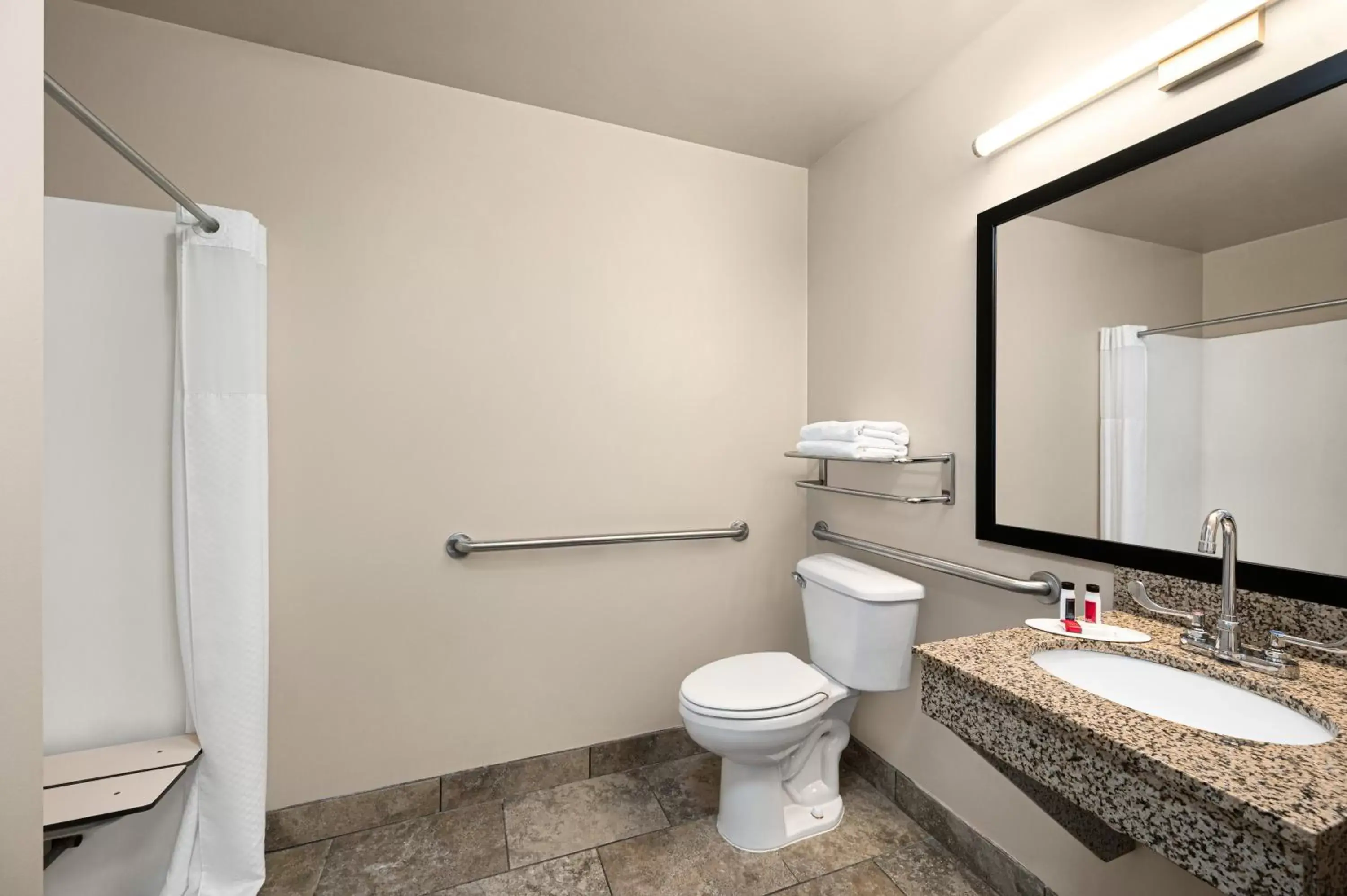 Bathroom in Baymont by Wyndham Buffalo