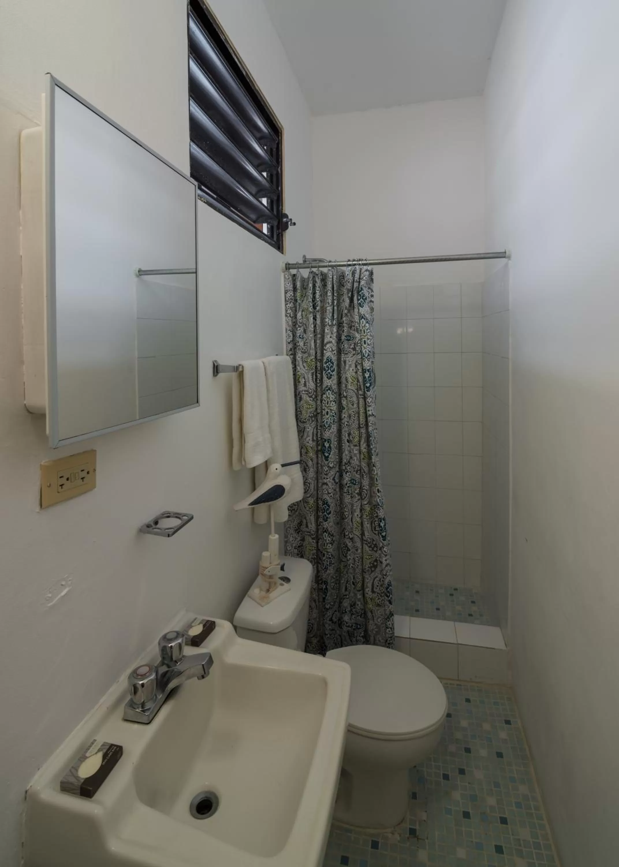 Bathroom in La Capitana Old San Juan Building