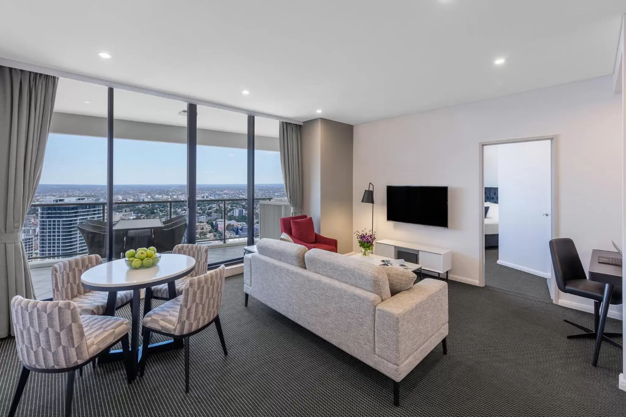 Bed, Seating Area in Meriton Suites Kent Street, Sydney