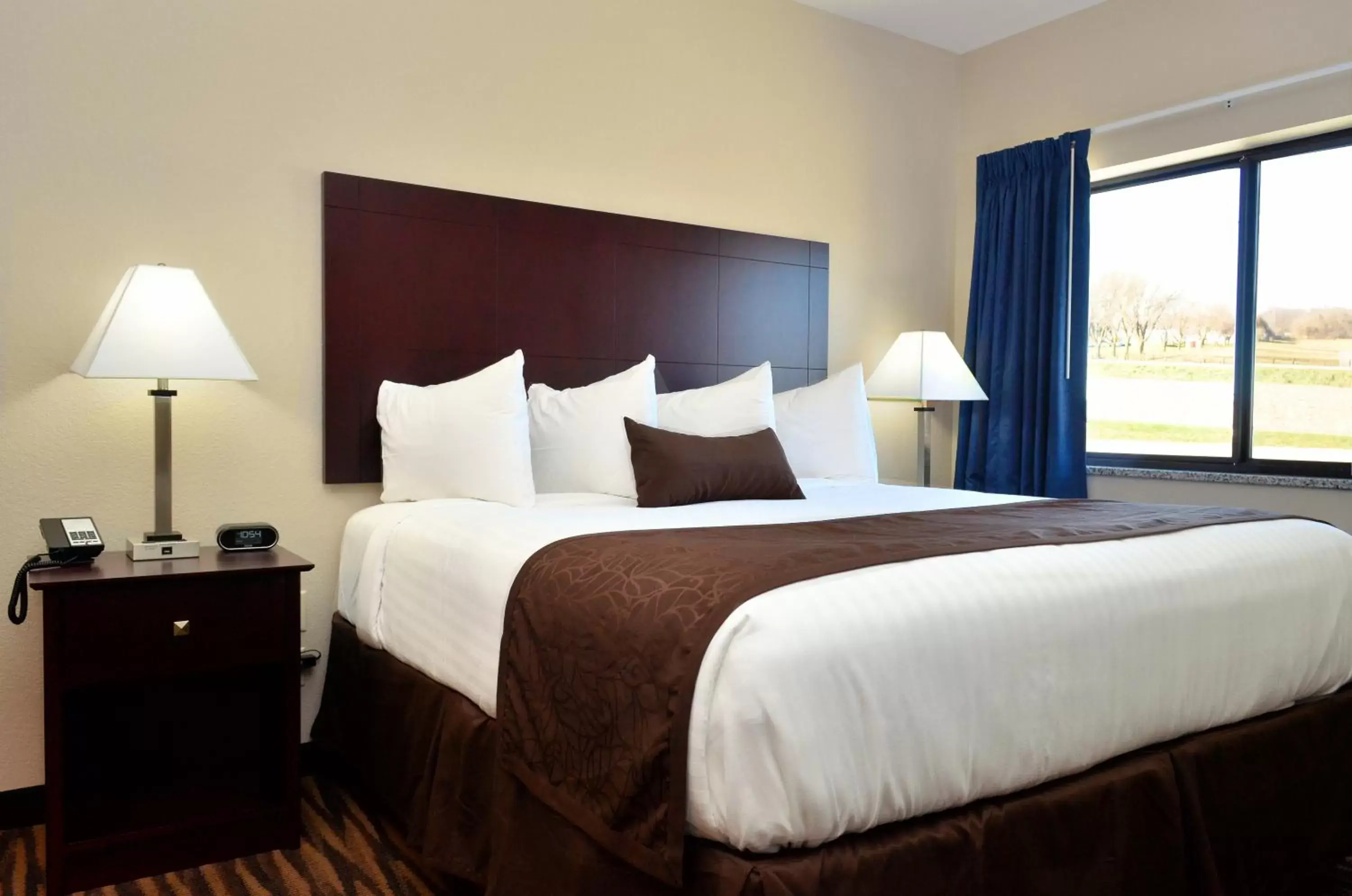 Bed in Cobblestone Inn & Suites - Manning