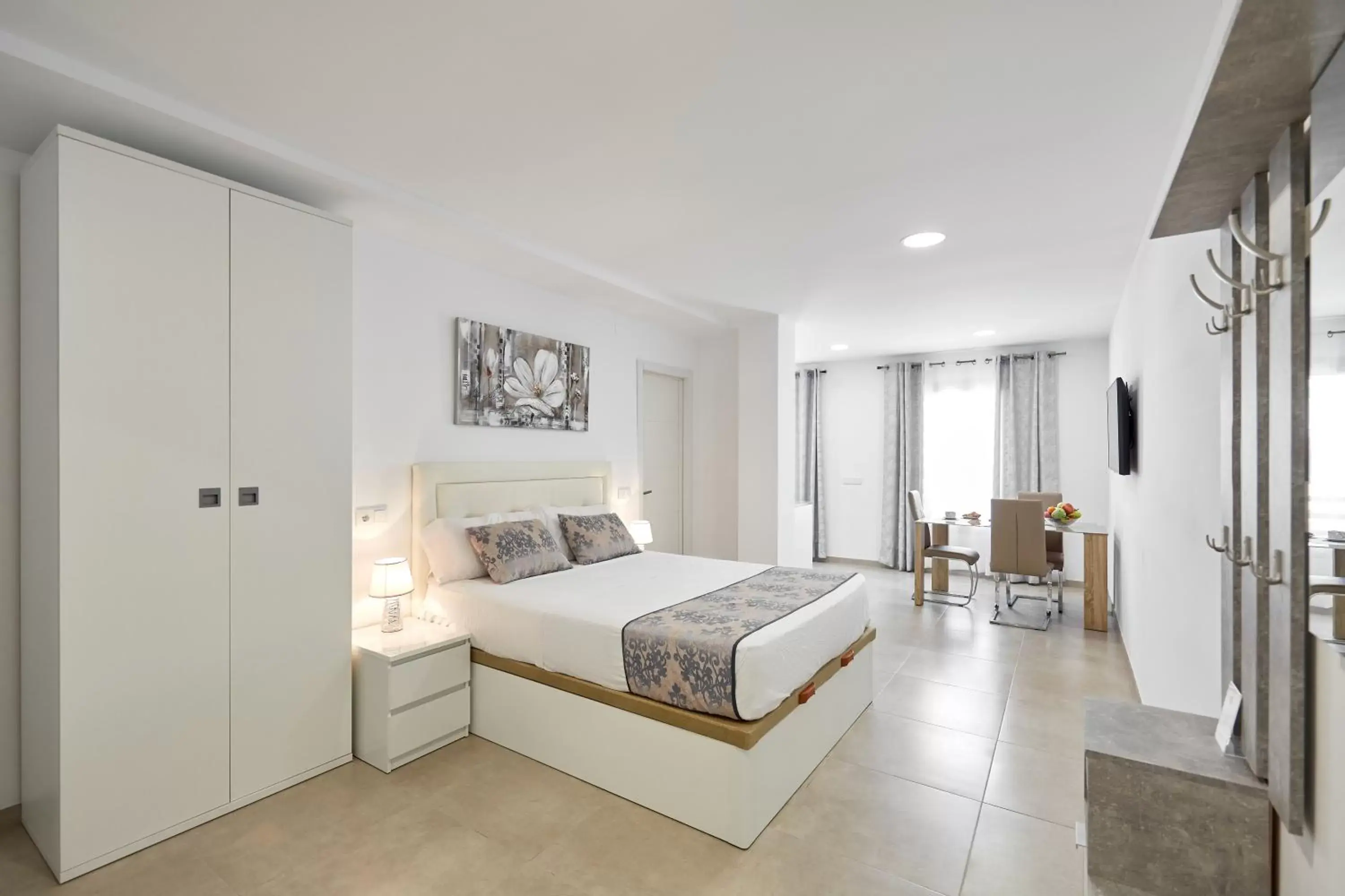 Bed in Sonrisa Deluxe Apartments, Levante