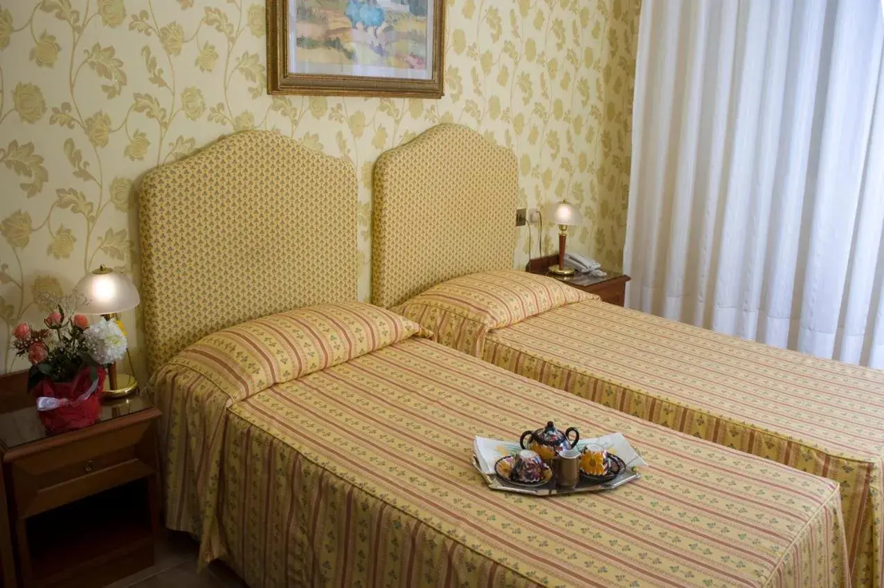 Bed in Hotel Beatrice