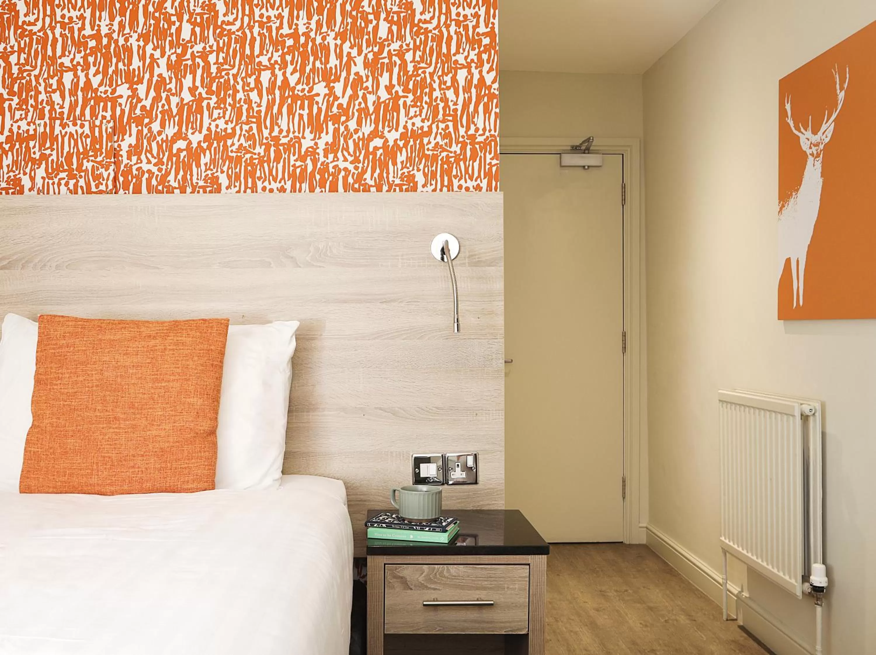 Bed in Cairn Hotel & Apartments