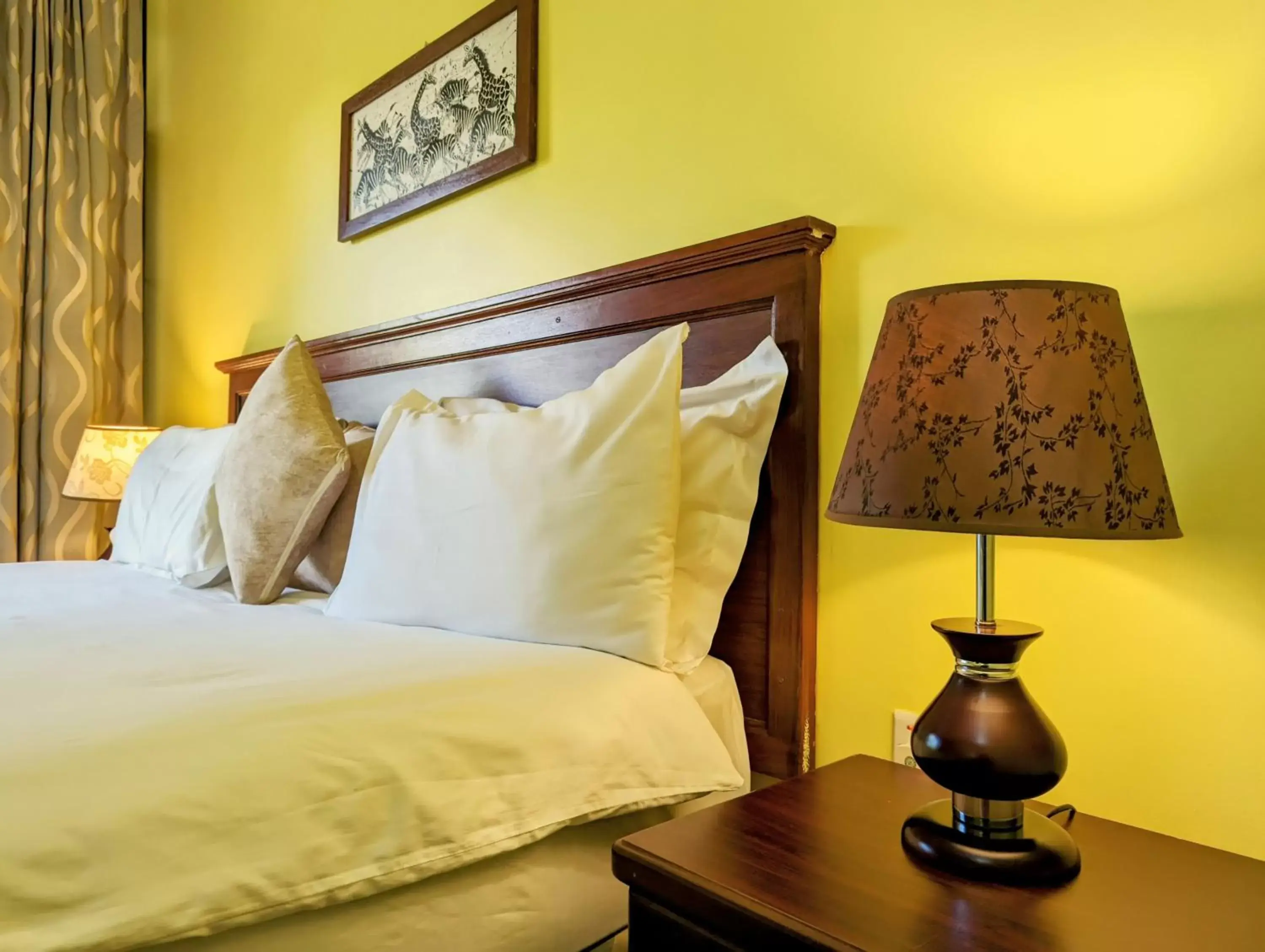 Bed in Mvuli Hotels Arusha