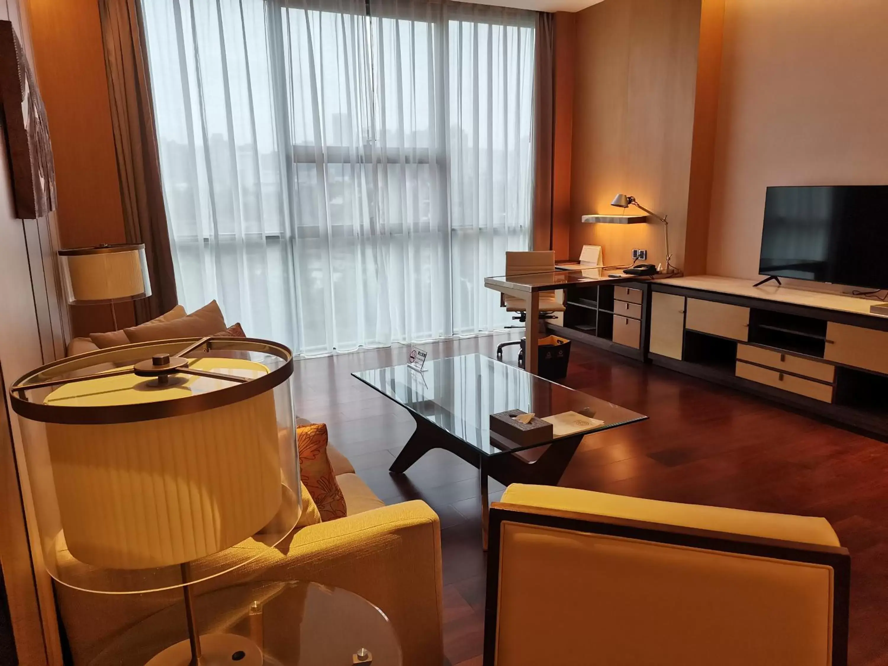 Dining area, TV/Entertainment Center in The OCT Harbour, Shenzhen - Marriott Executive Apartments