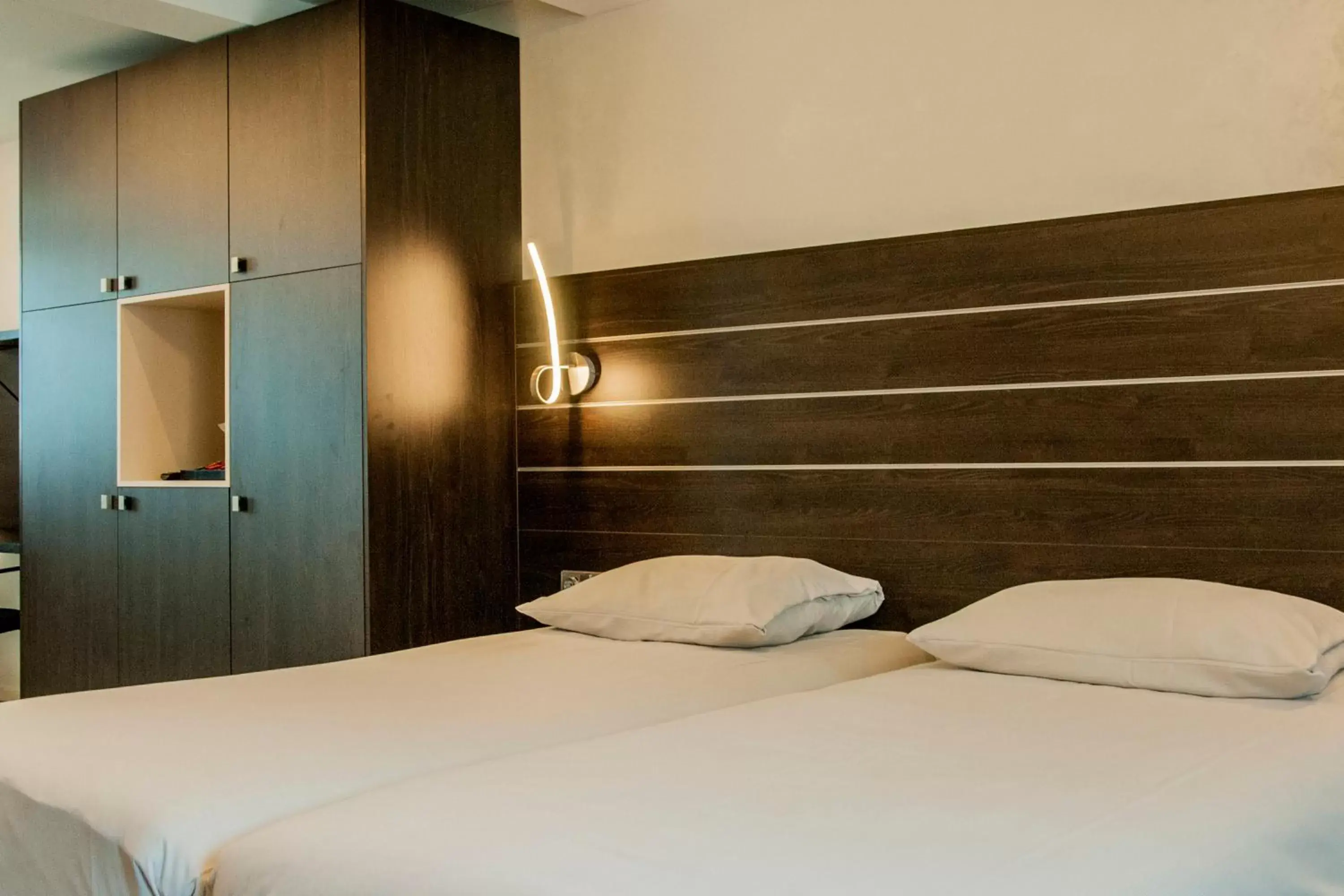 Bed in Hotel Dekkers