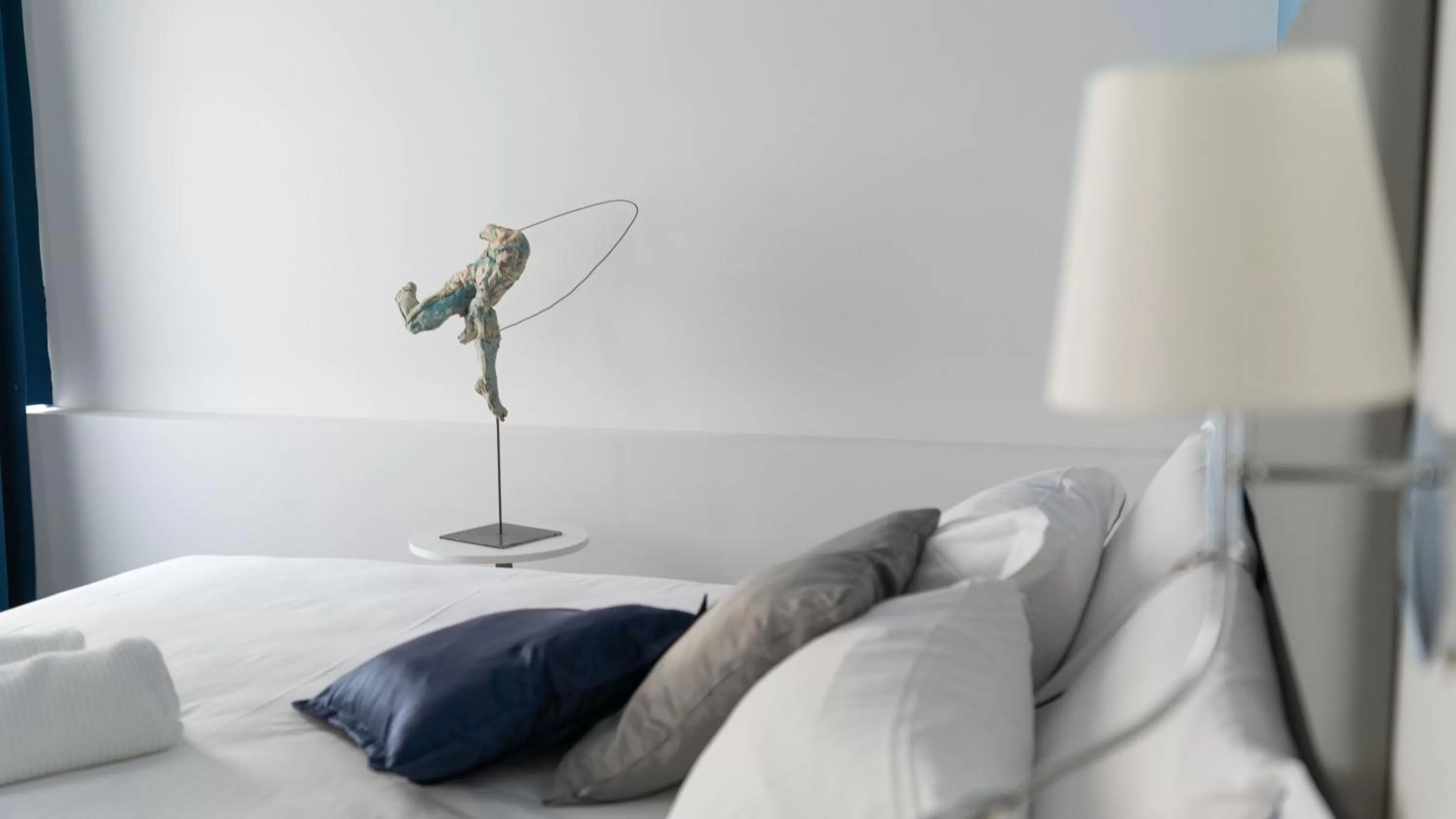 Bed in Palazzo Cappuccini Art Relais