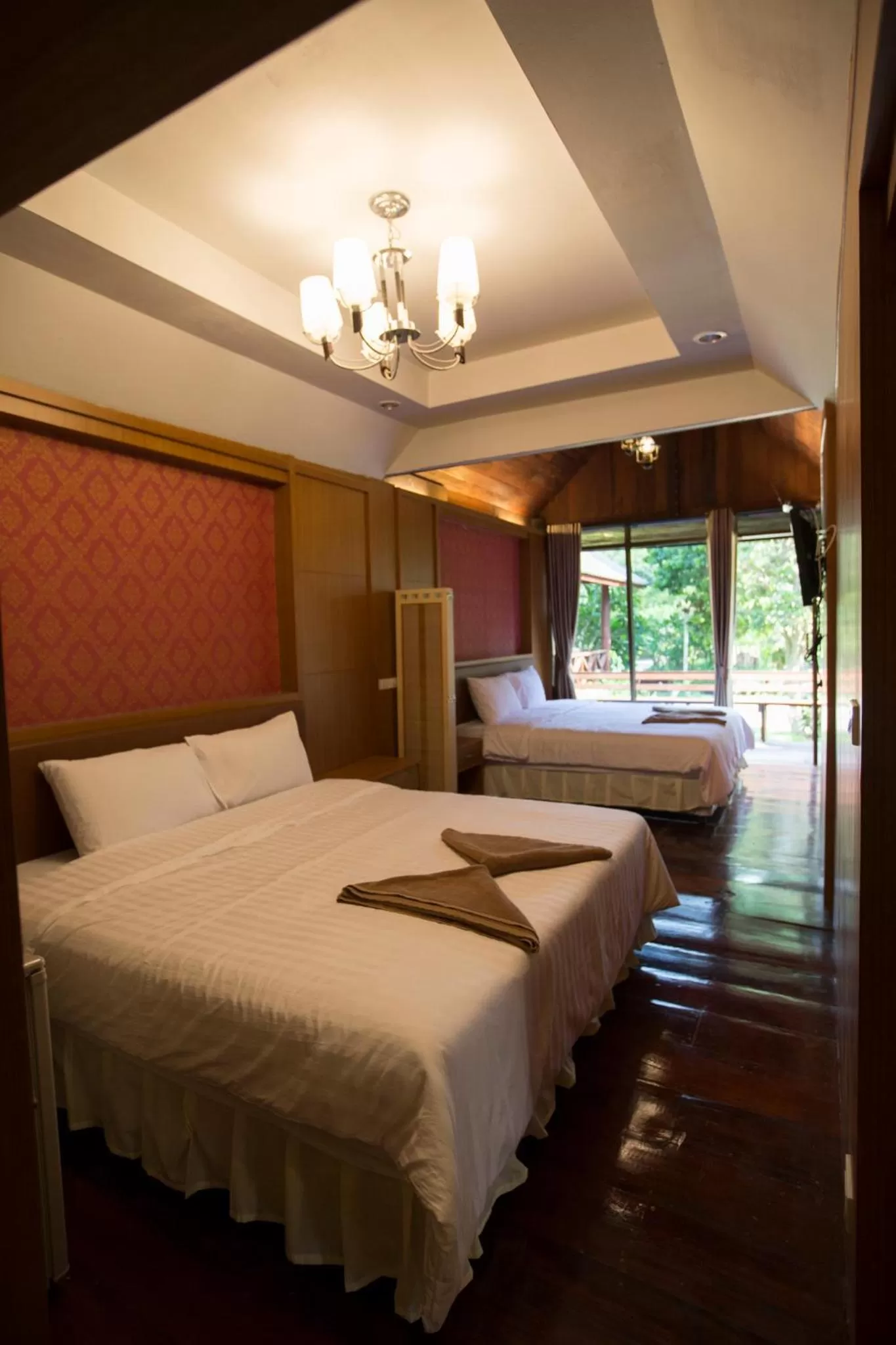 Photo of the whole room, Bed in Ruan Kanchanok