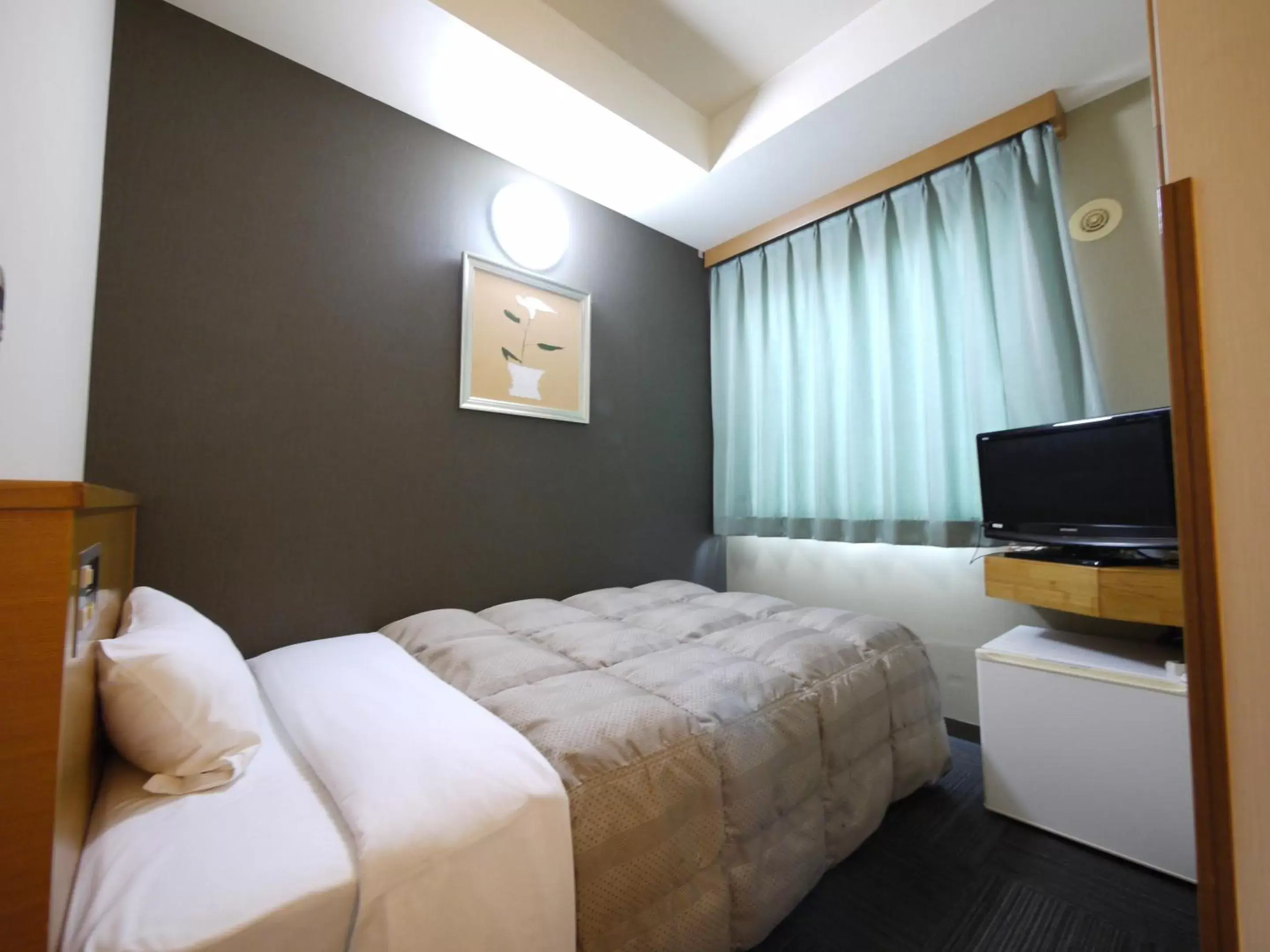 Bed in Hotel Route-Inn Court Fujioka